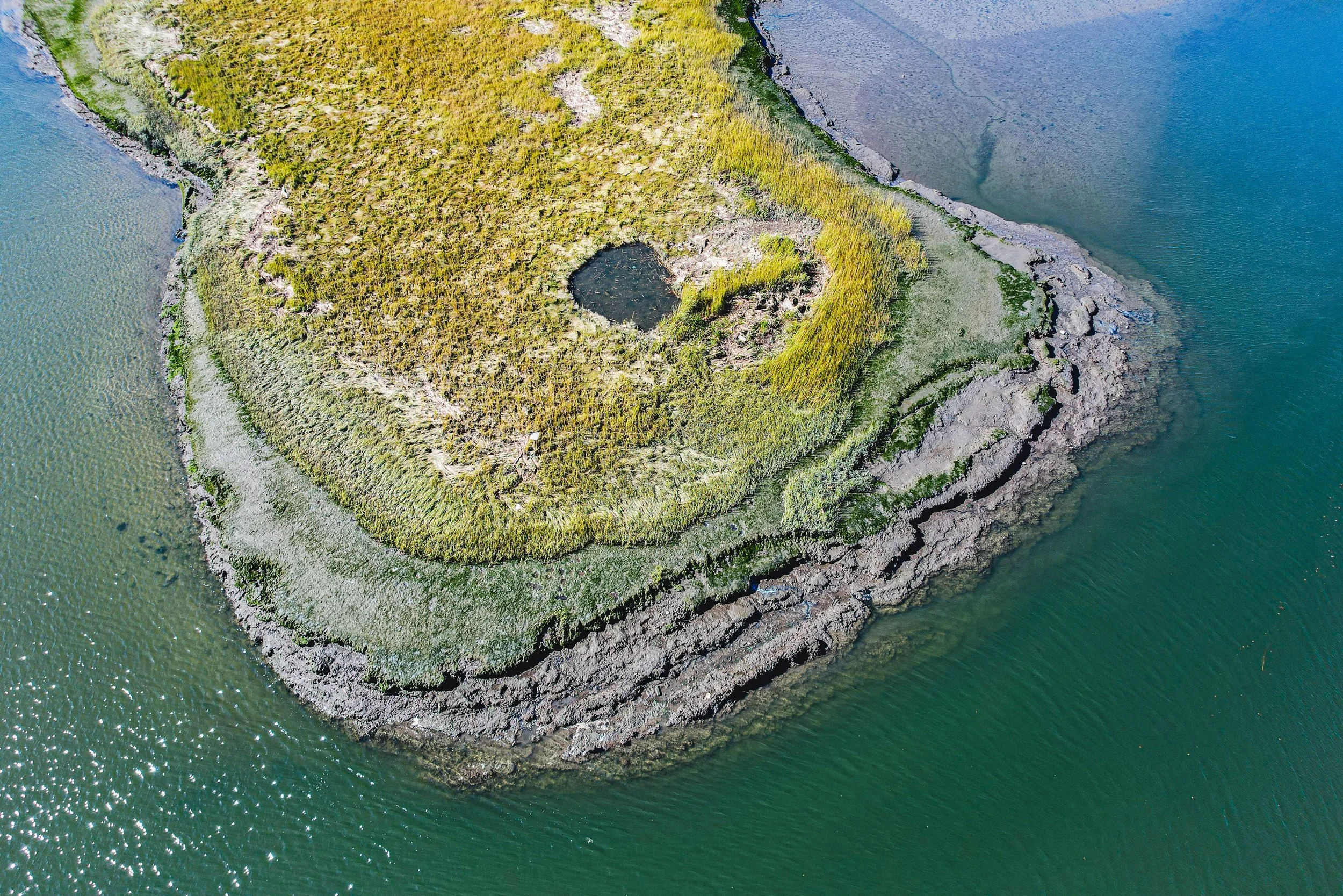 What looks like a simple riverbank is actually a time capsule of the Saugus River’s past.