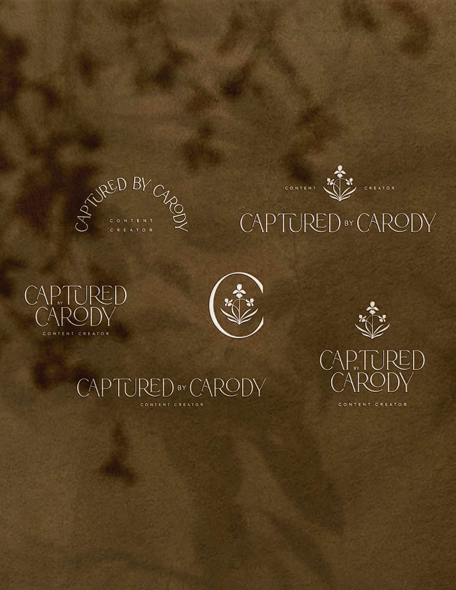 Multiple logos for 'Captured by Carody,' featuring floral designs and crescent moon motifs, on a brown textured background.