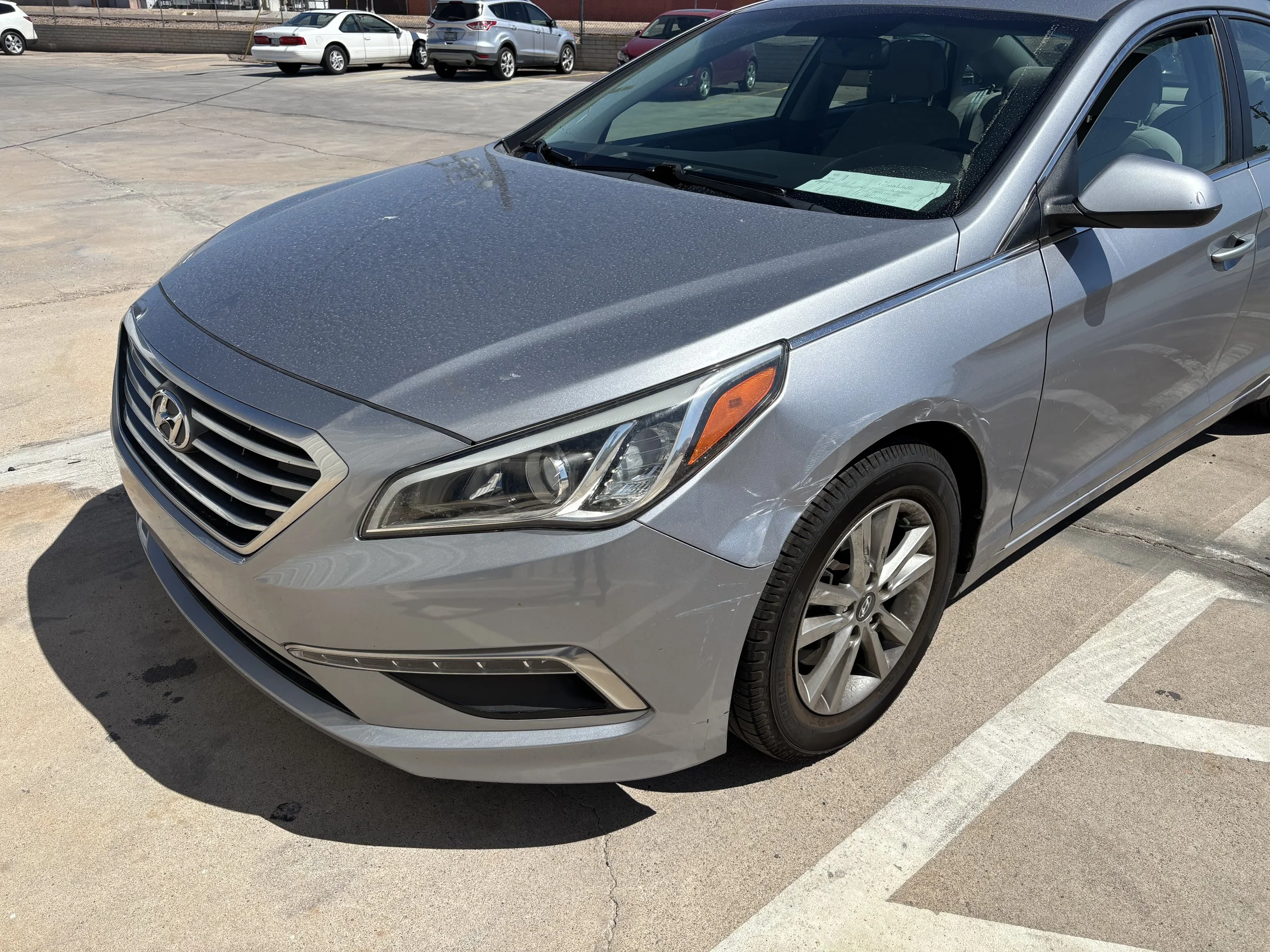 2015 Hyundai Sonata - We repaired the front bumper cover and replaced the fender on this Hyundai, restoring its sleek factory look.