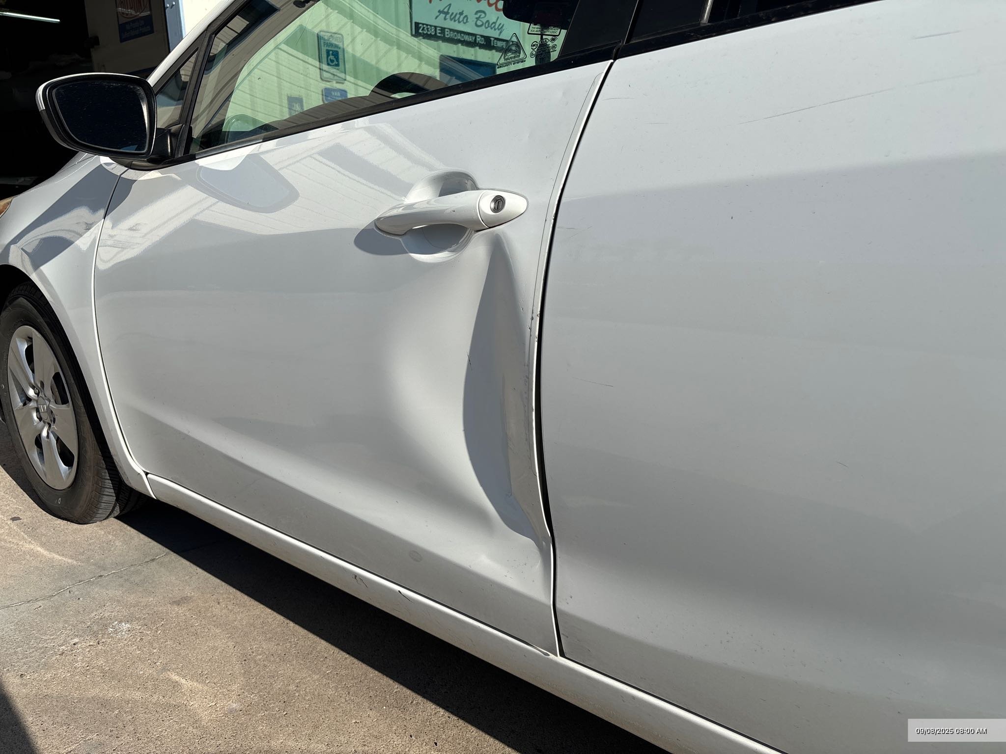 2016 Kia Forte - We replaced and perfectly matched the front door on this Kia, restoring it to its original condition.