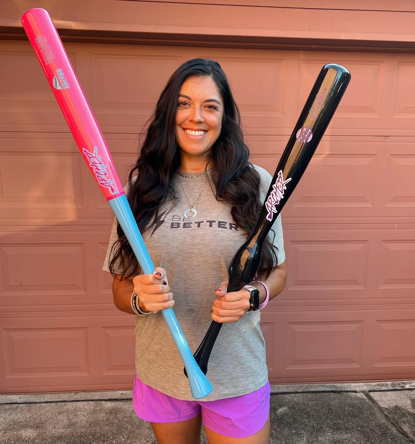 Jessica Bowden, the Softball Doctor, with bats from Archer Bat Co.