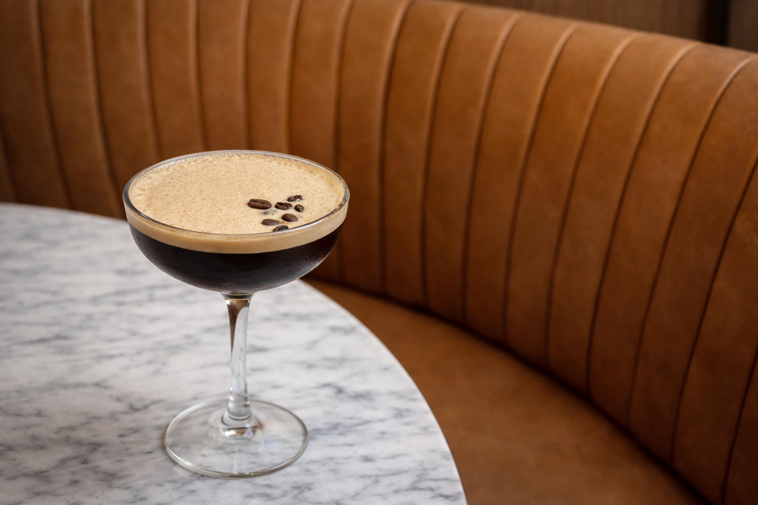 Espresso martini with coffee bean garnish served at 10 Pounds in Pyrmont.