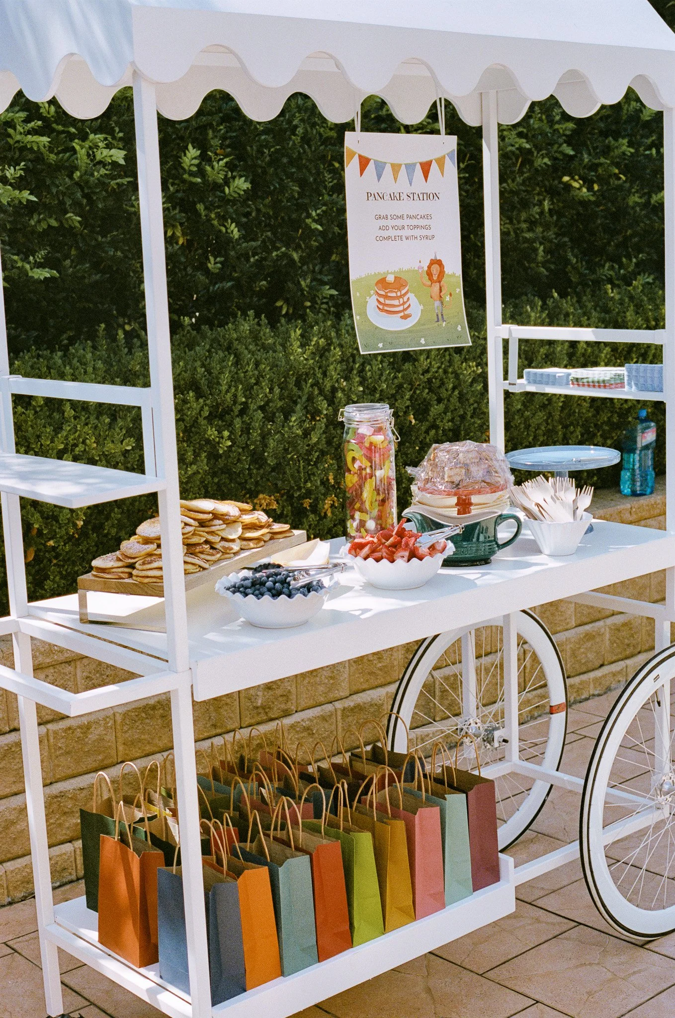 Pancake catering cart and coffee cart by 10 Pounds set up outdoors for a private event by 10 Pounds Catering.