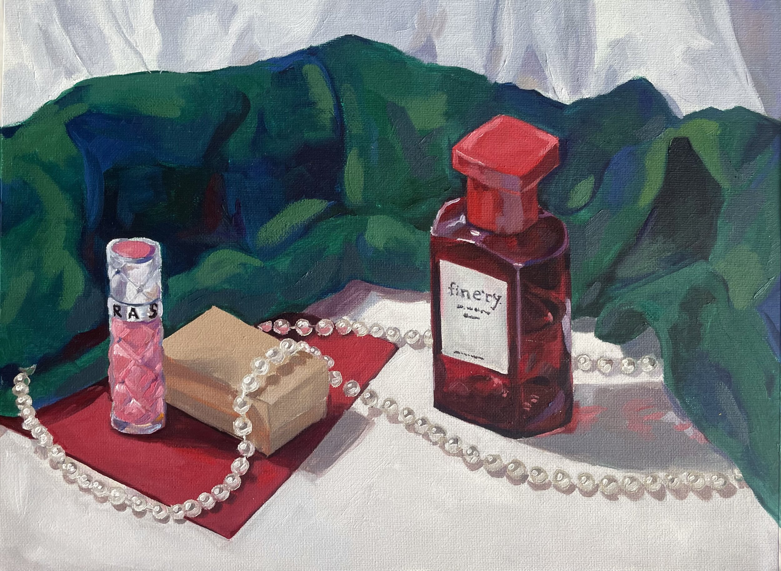 Oil still life painting including a red perfume bottle, a string of pearls, pink lip gloss, a small cardboard box, and red paper on a white table. There's a dark green and blue scarf in the background