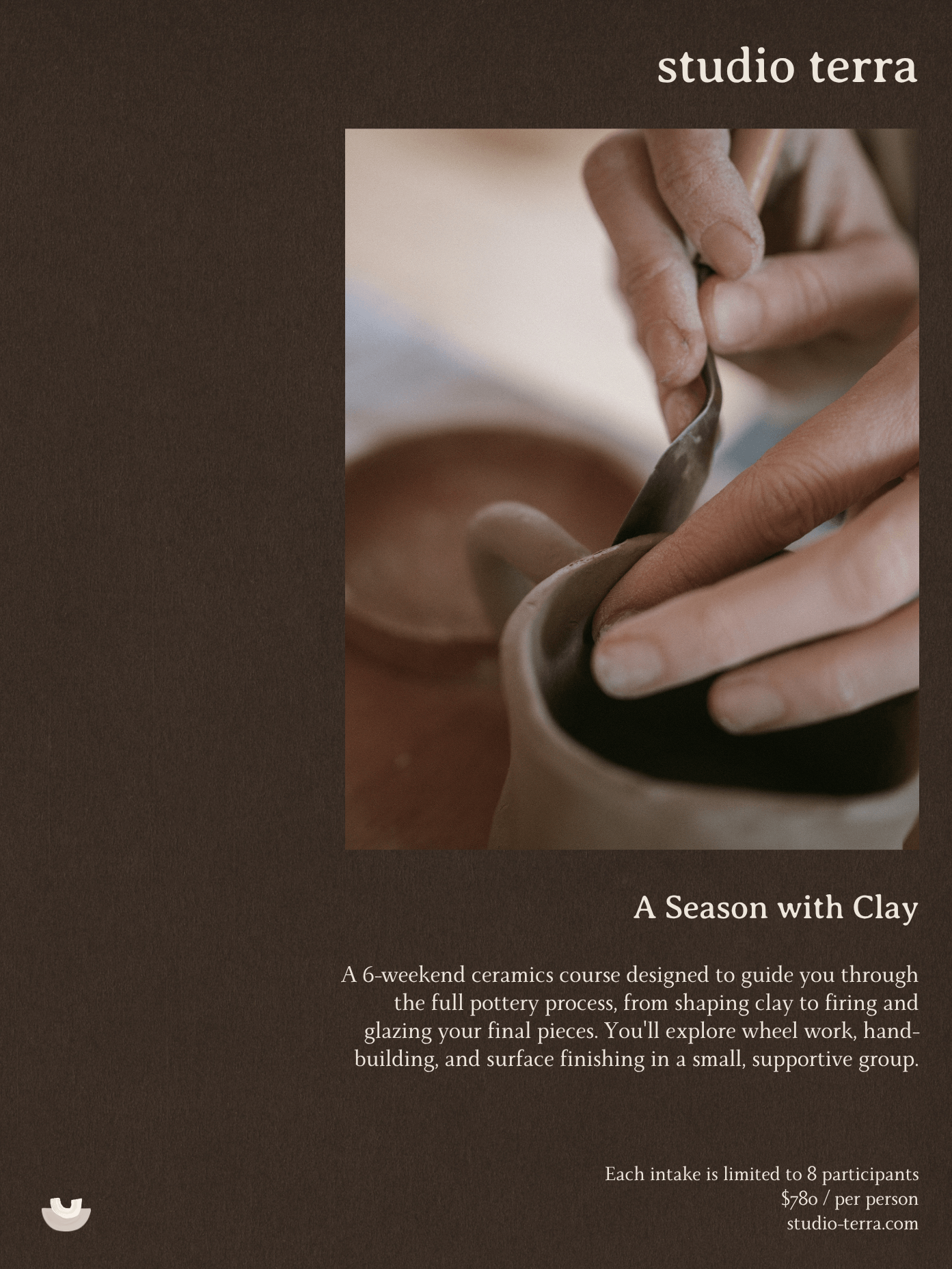 Close-up of a person shaping a clay pot on a pottery wheel in a ceramics studio.