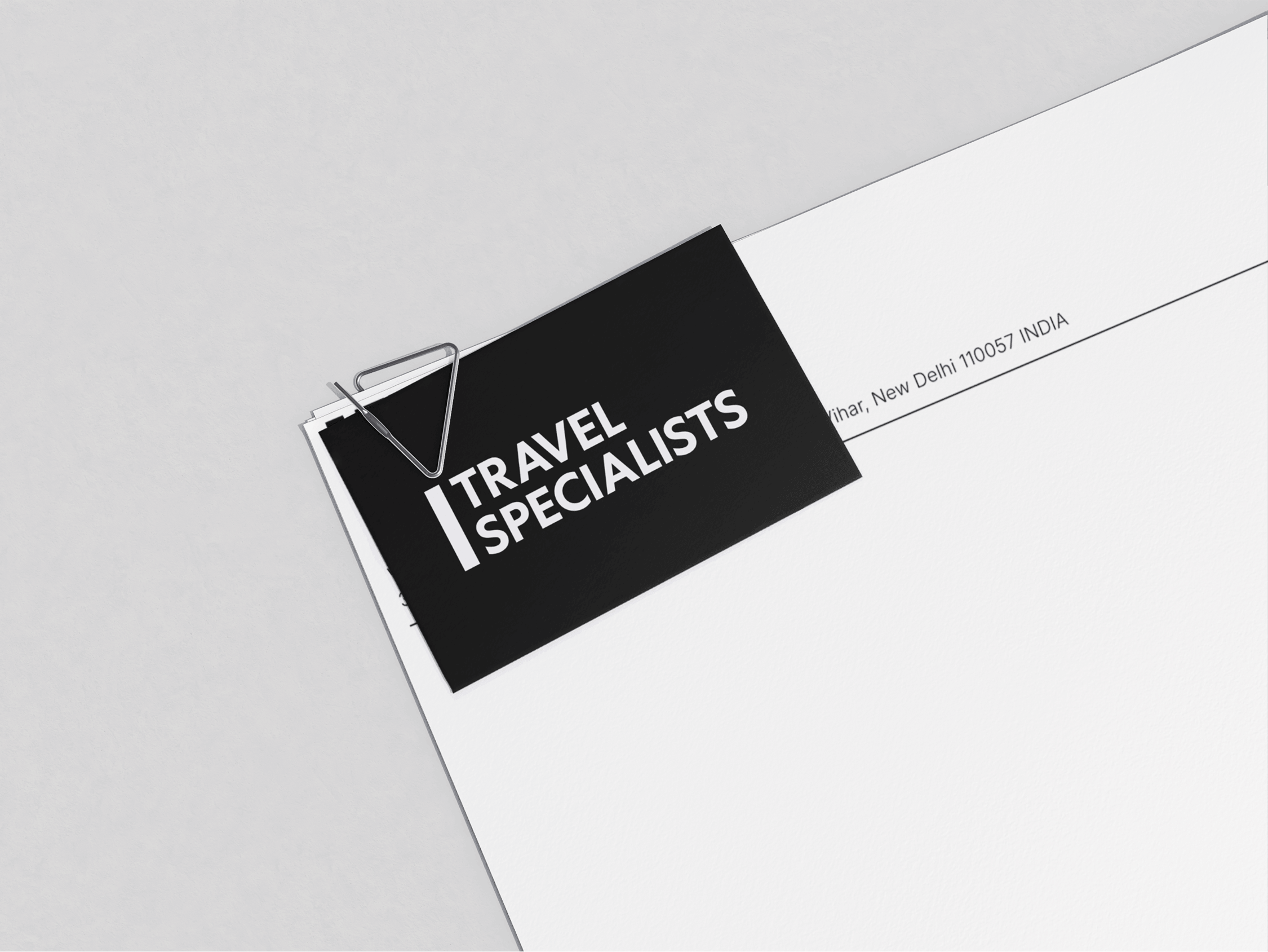 Custom business card and branded stationery design for corporate travel services. Corporate brand identity and premium print collateral layout.