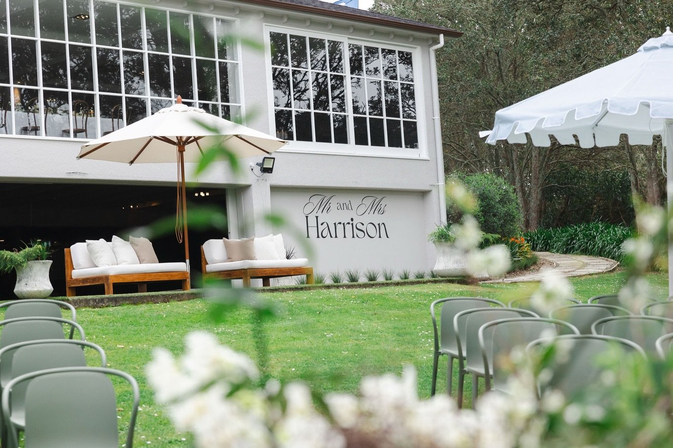 Your name, your brand, your moment, beautifully displayed on our waterside garden bar wall.

This feature wall offers a simple, yet intentional backdrop for personalised details, from wedding names to event branding, creating a thoughtful welcome for