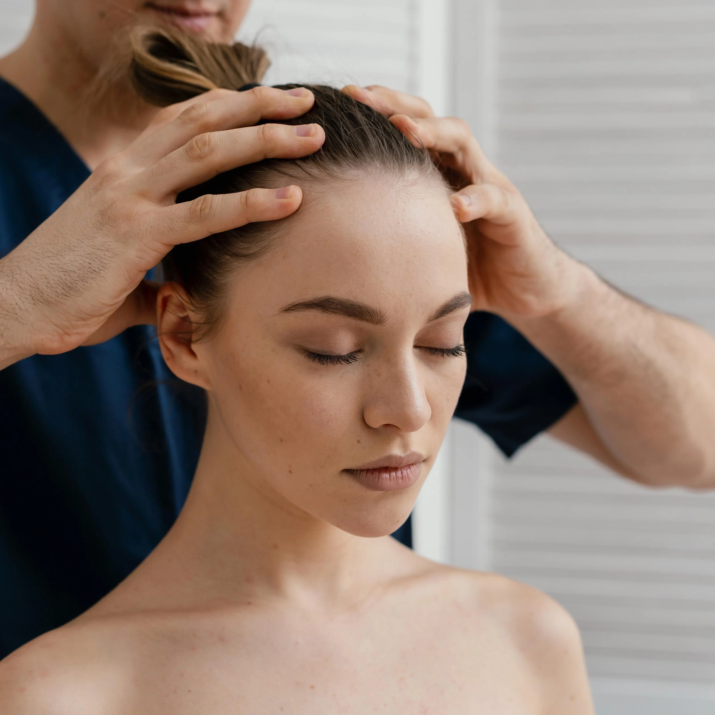 close-up-hands-massaging-scalp.jpg
