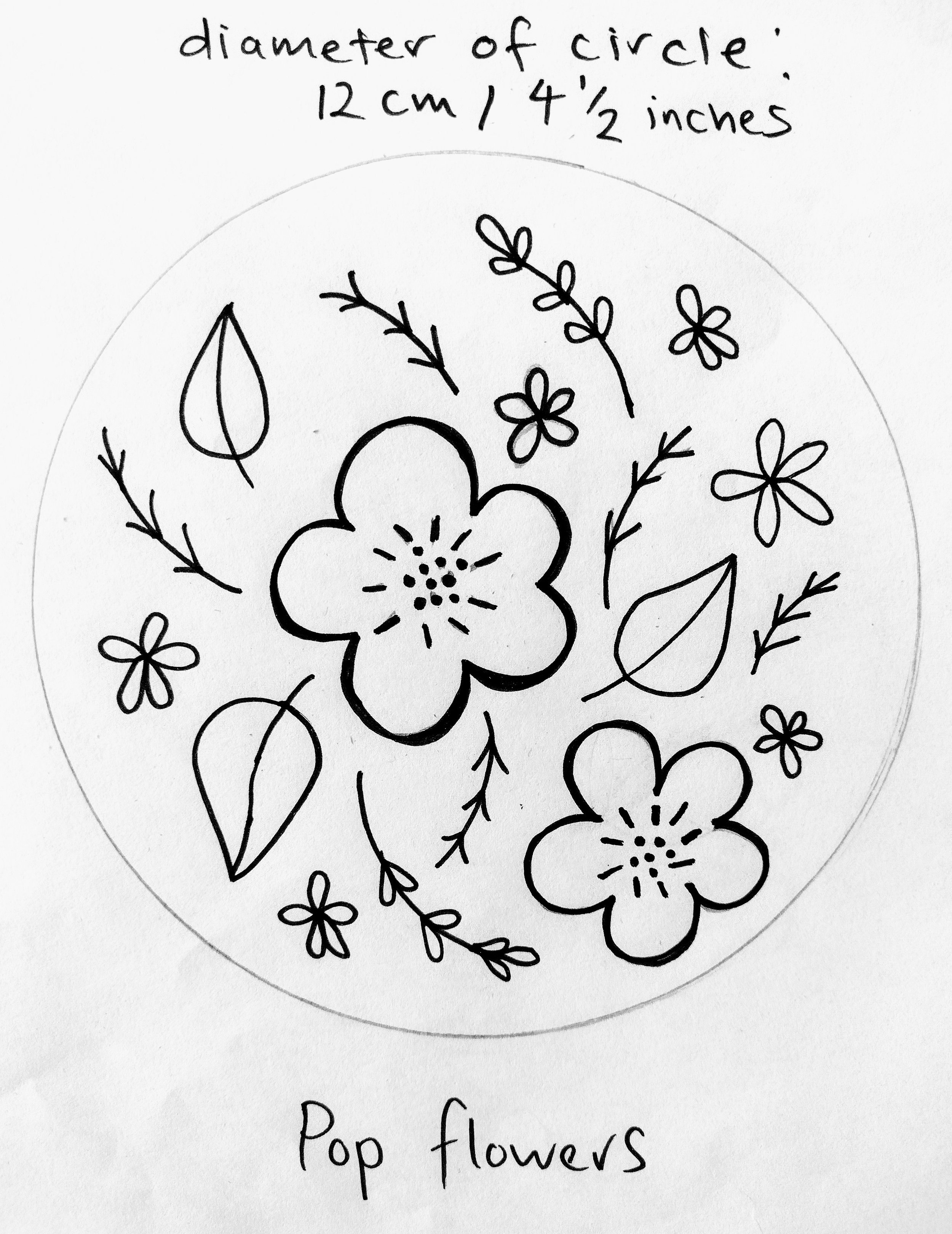 Hand-drawn illustration of various pop flowers and leaves with the text 'diameter of circle: 12 cm / 4 1/2 inches' at the top and 'Pop flowers' at the bottom.