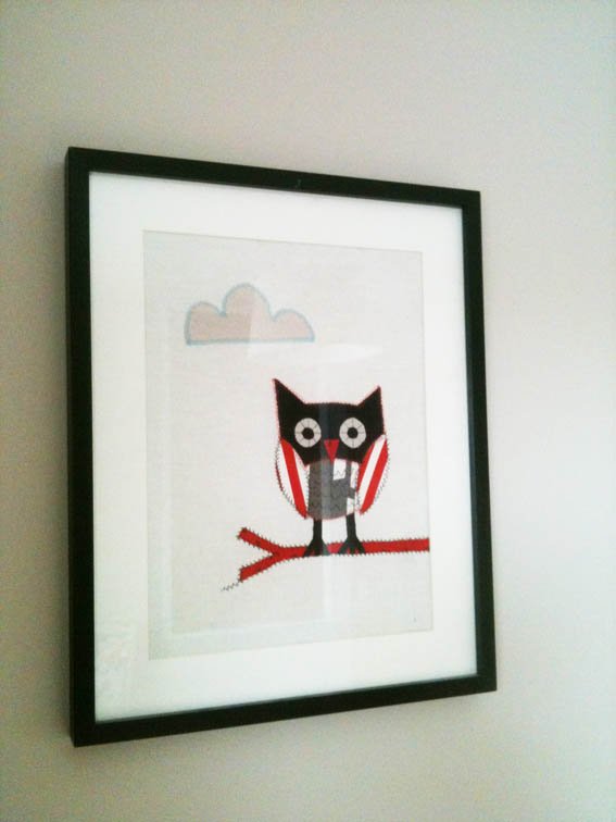 Framed art print of a stylized cartoon owl sitting on a branch with a cloud in the background.
