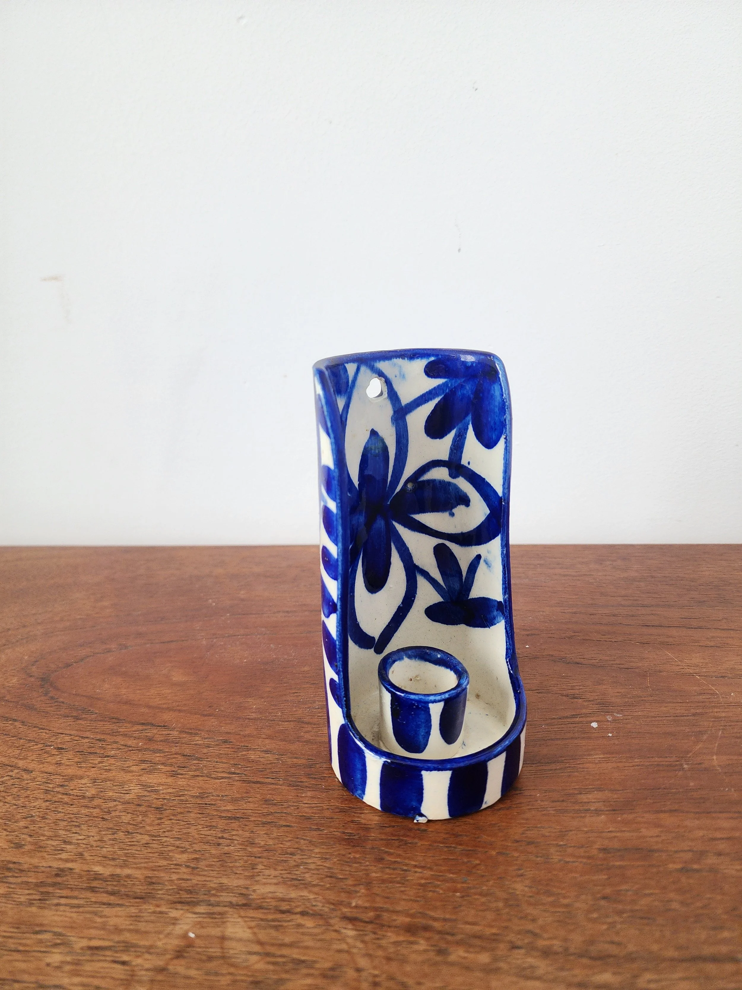 Spanish hand-painted candlestick with Mediterranean charm.