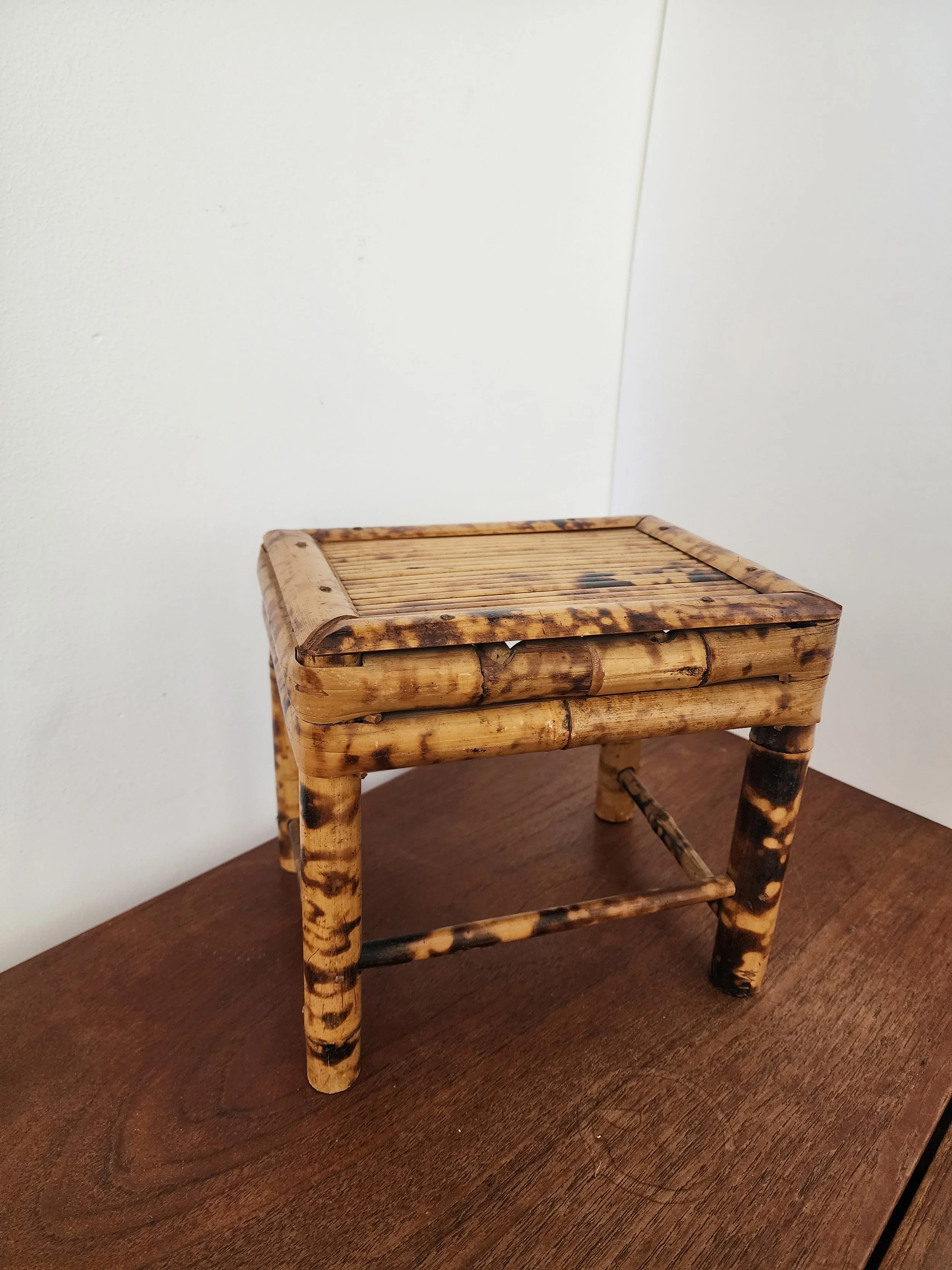 Vintage tropical furniture piece styled for modern home.