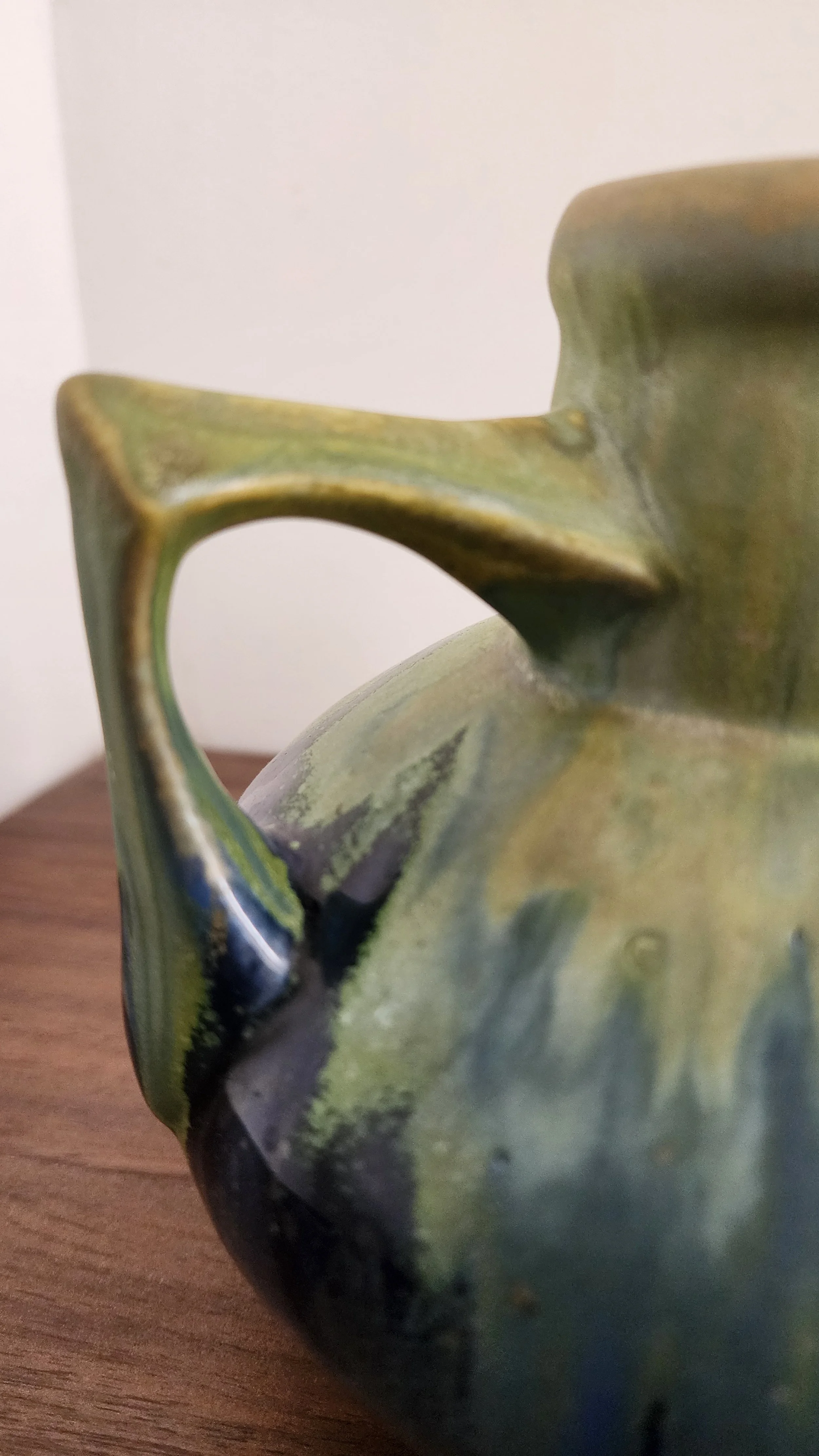 Top view highlighting amphora neck and handle symmetry.