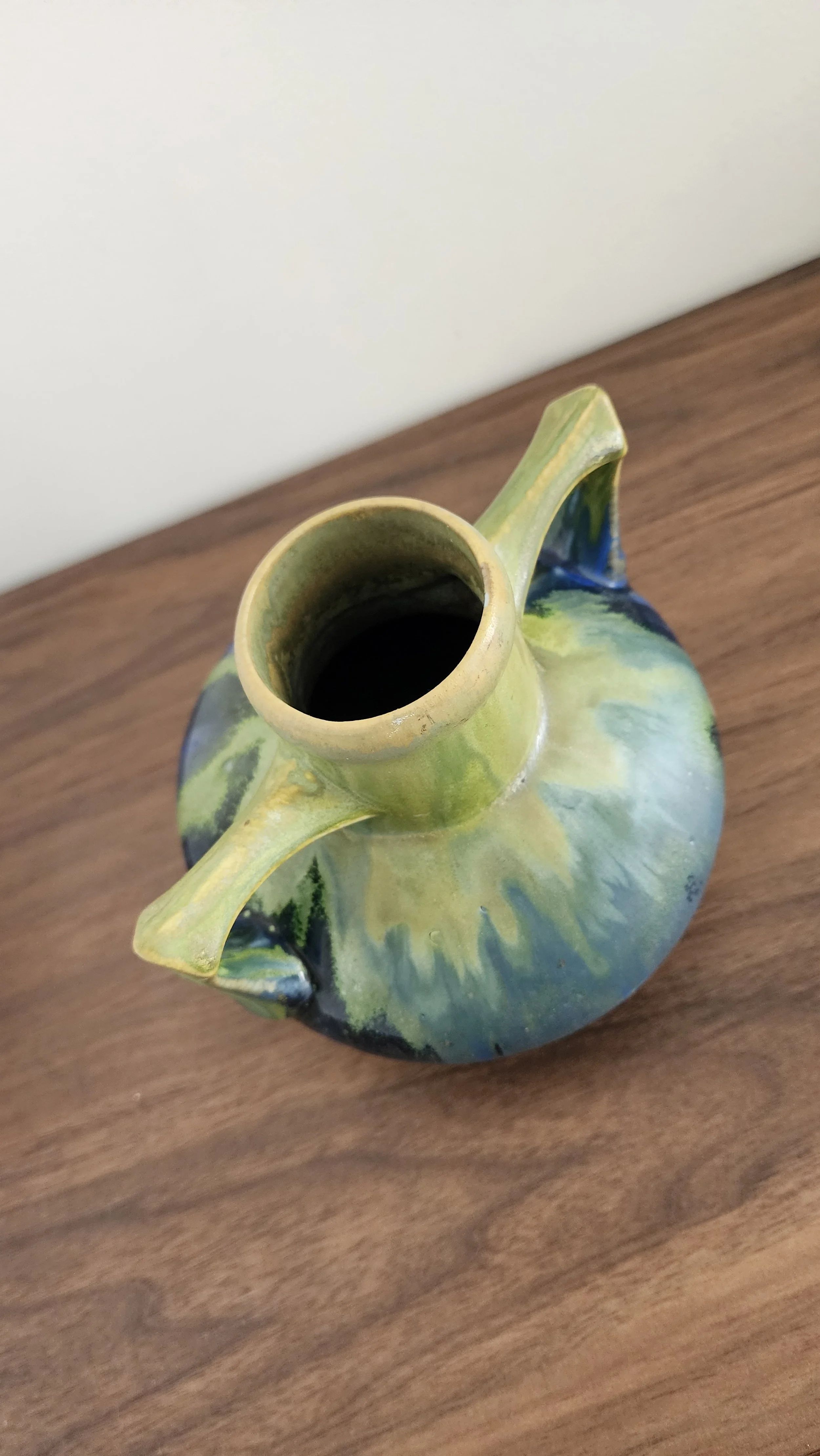 Close-up of glaze transitions in cobalt blue and green.