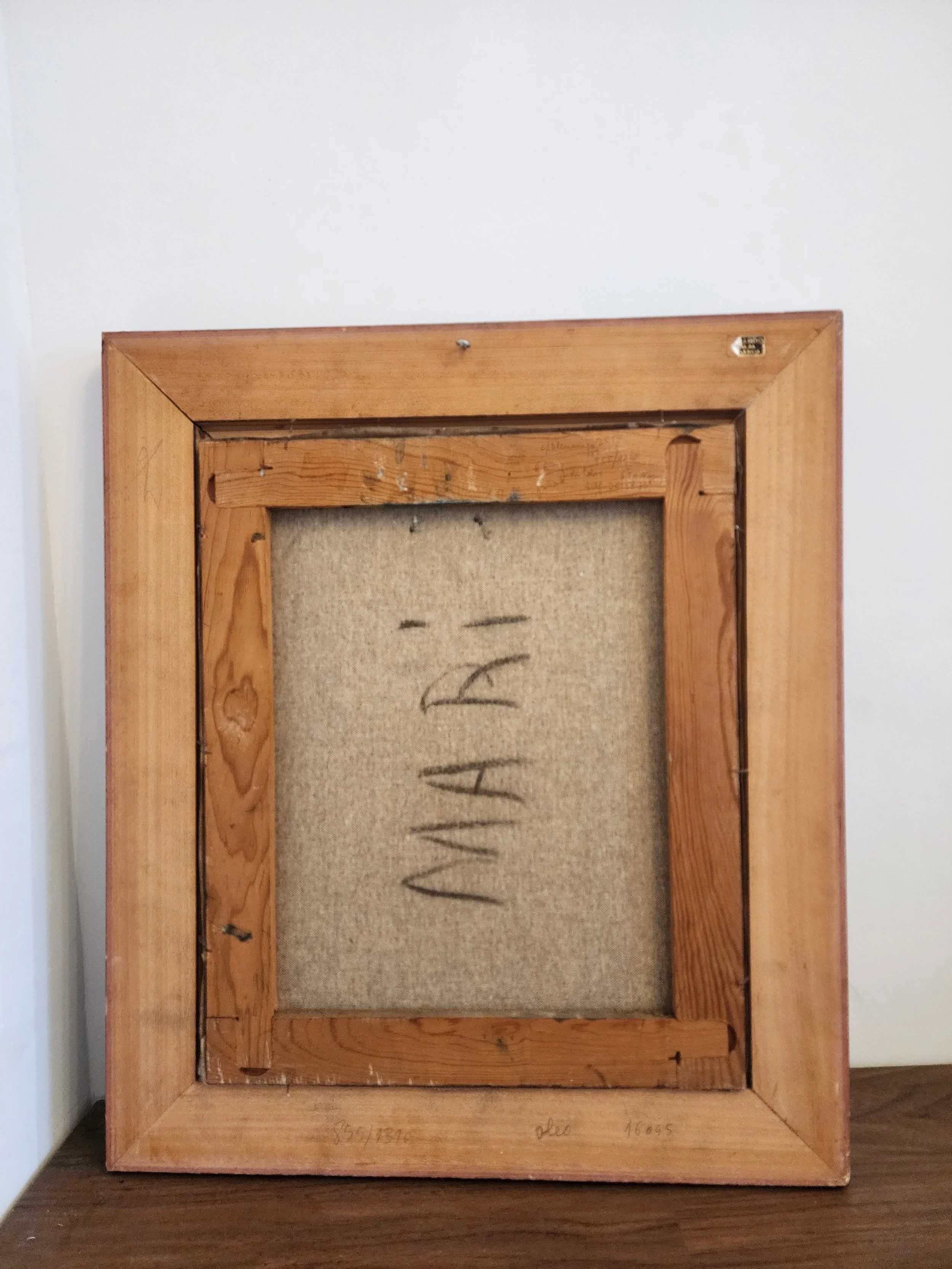 Image 4: Back view of framed painting with hanging hardware