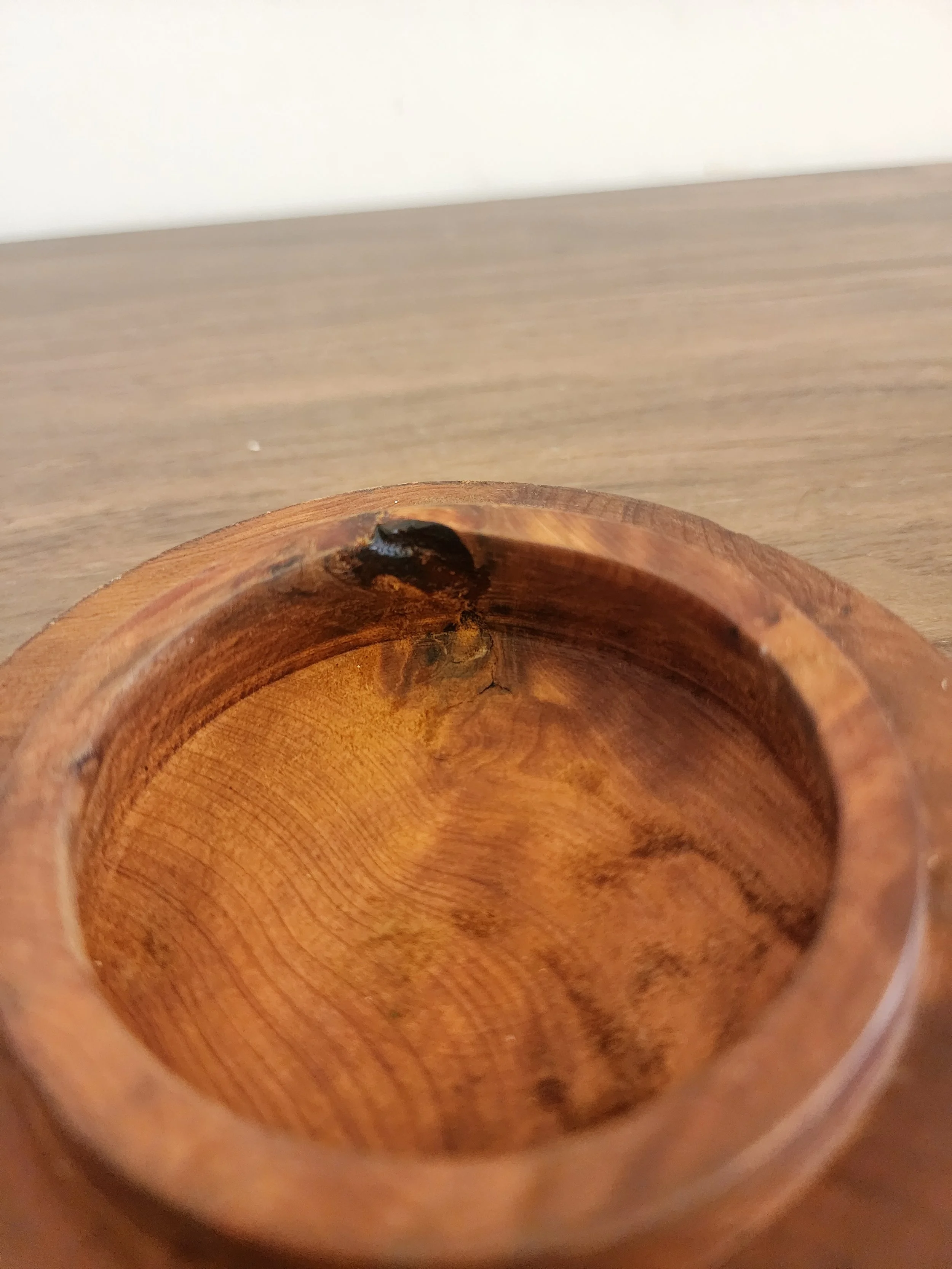 Close-up of smooth burlwood texture and polish.