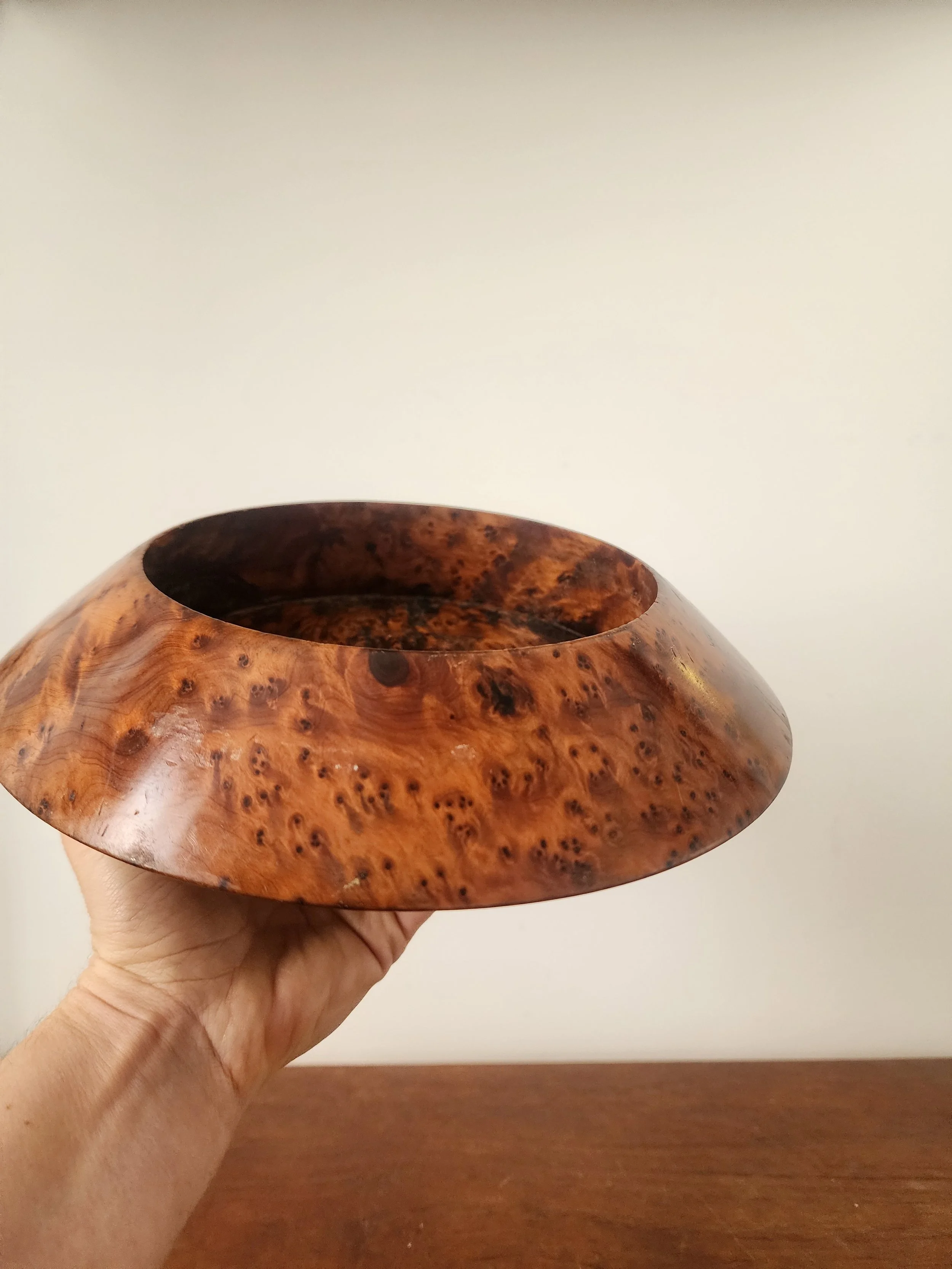 organic wood decor bowl styled on neutral surface