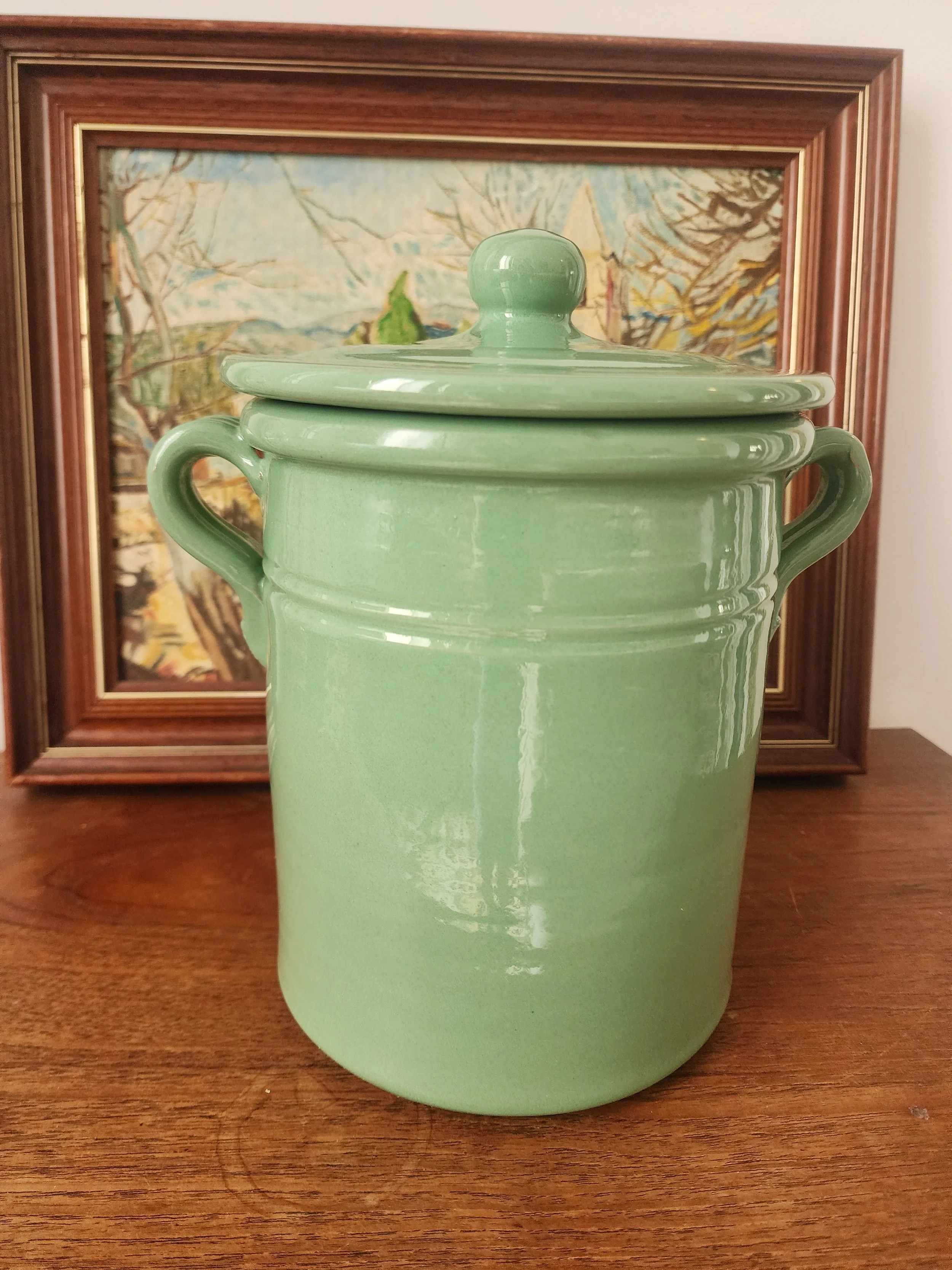 side view of vintage italian stoneware crock with handles