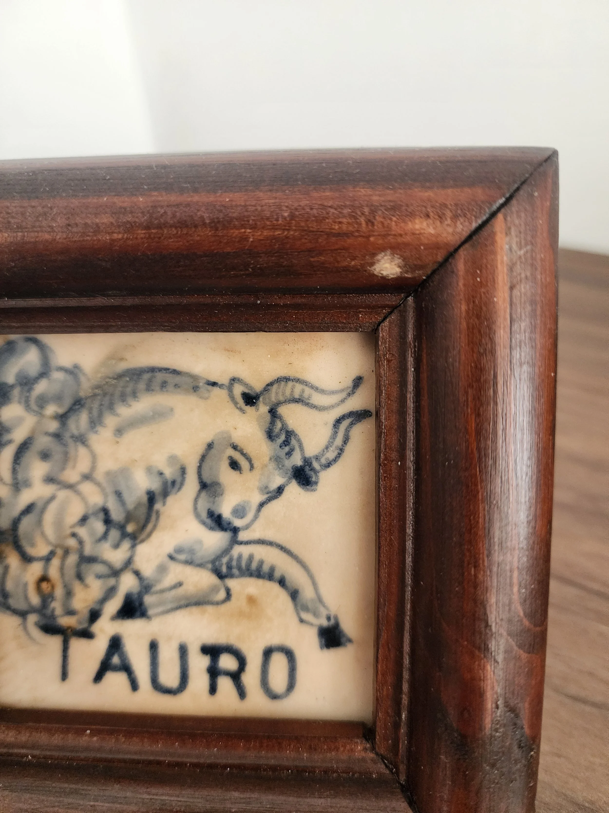 Close-up of antique tile detail and glaze texture.