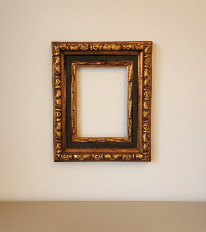 vintage gold ornate wooden picture frame with carved detailing