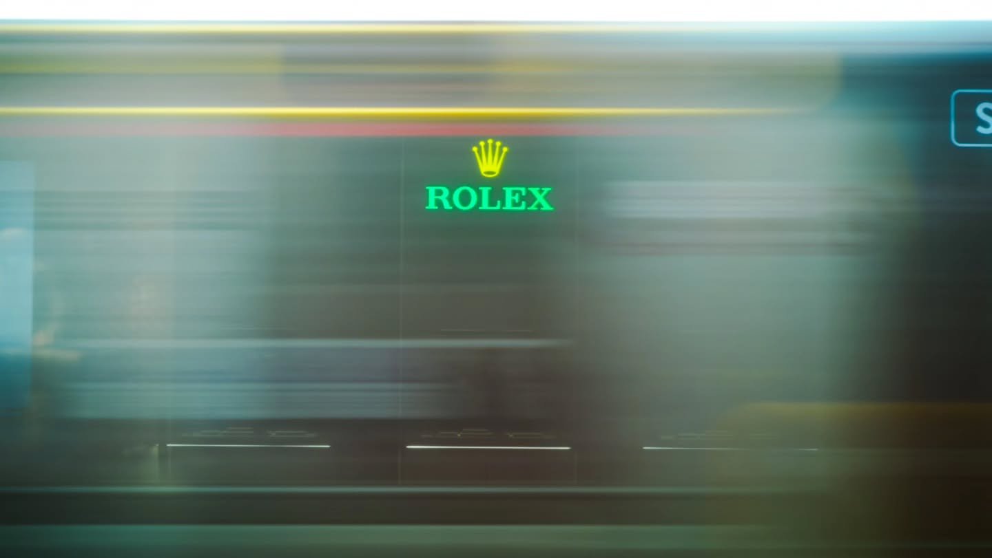 Shot handheld at f2.8, 1/4 shutter
Framed through the blur of a passing vehicle. 

The long shutter introduces intentional motion, guiding the eye to the still shopfront while layering depth and atmosphere into the frame.

#rolex #luxury #revivemedia