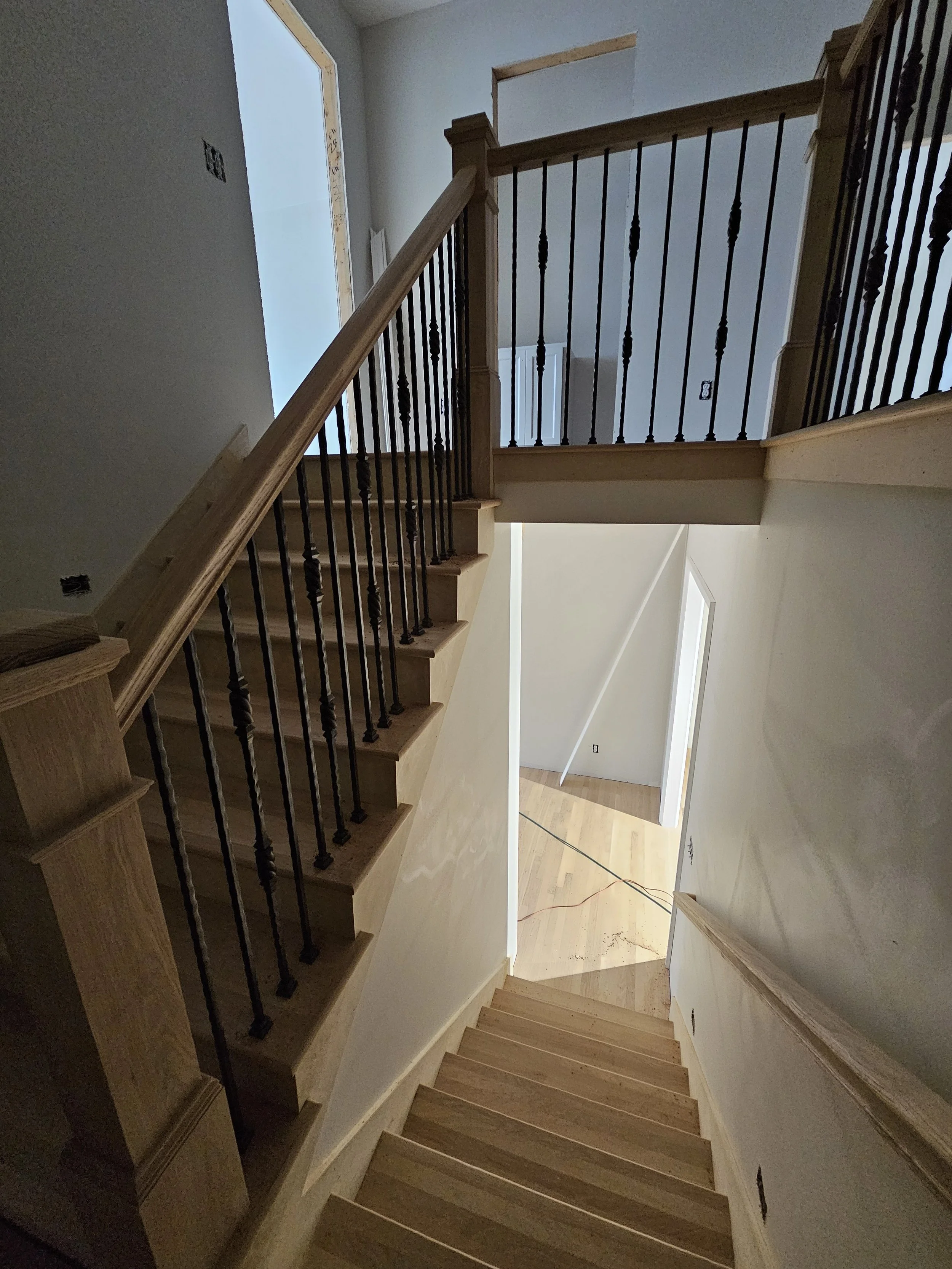 trussville box newels hammered wrought iron.jpg