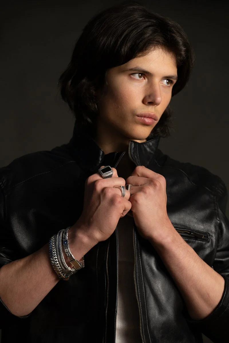 Model showcasing apparel in a commercial fashion campaign photograph.