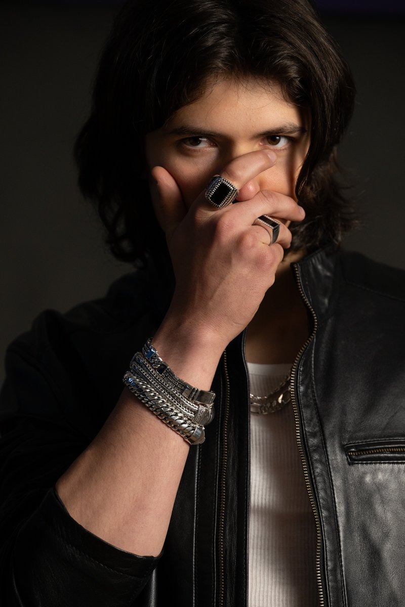 Model showcasing apparel in a commercial fashion campaign photograph.