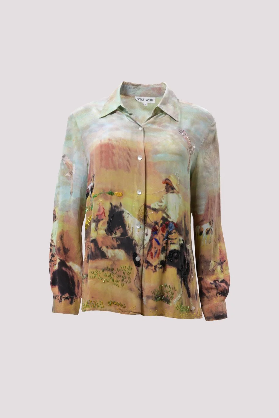 A long-sleeve button-up shirt with a painted Western scene featuring cowboys, horses, and a landscape.