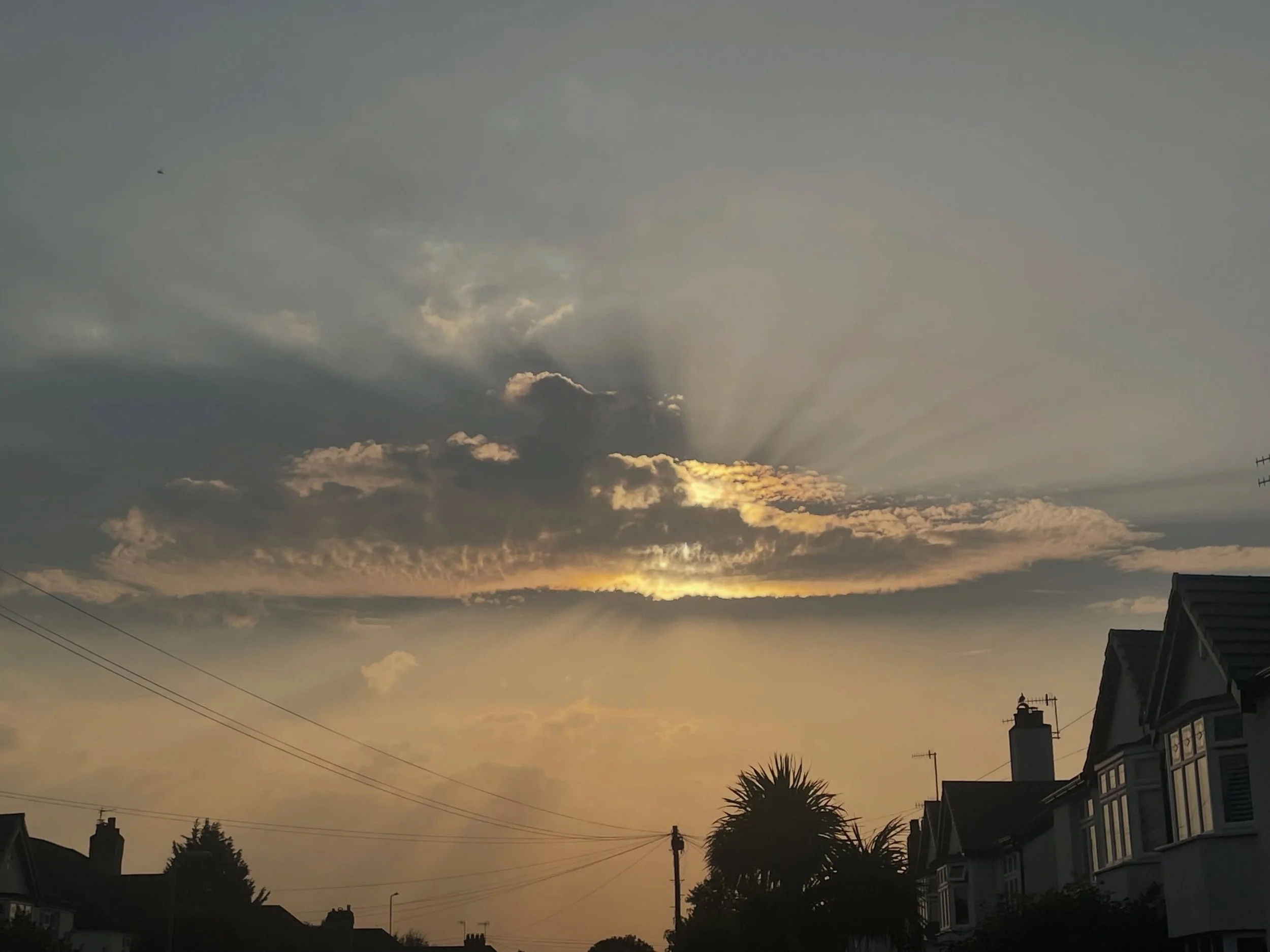 The cloud over the eclipse. The dark reaching from the light.