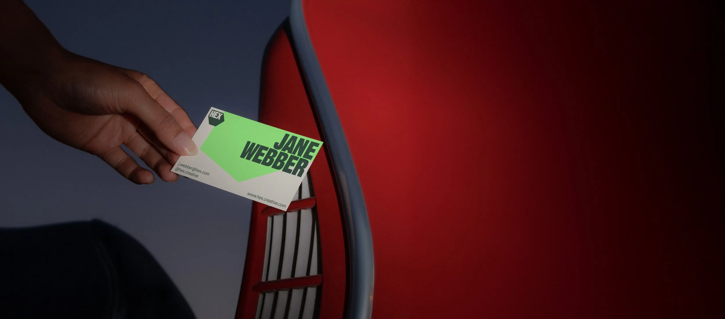 Business owner handing out business card