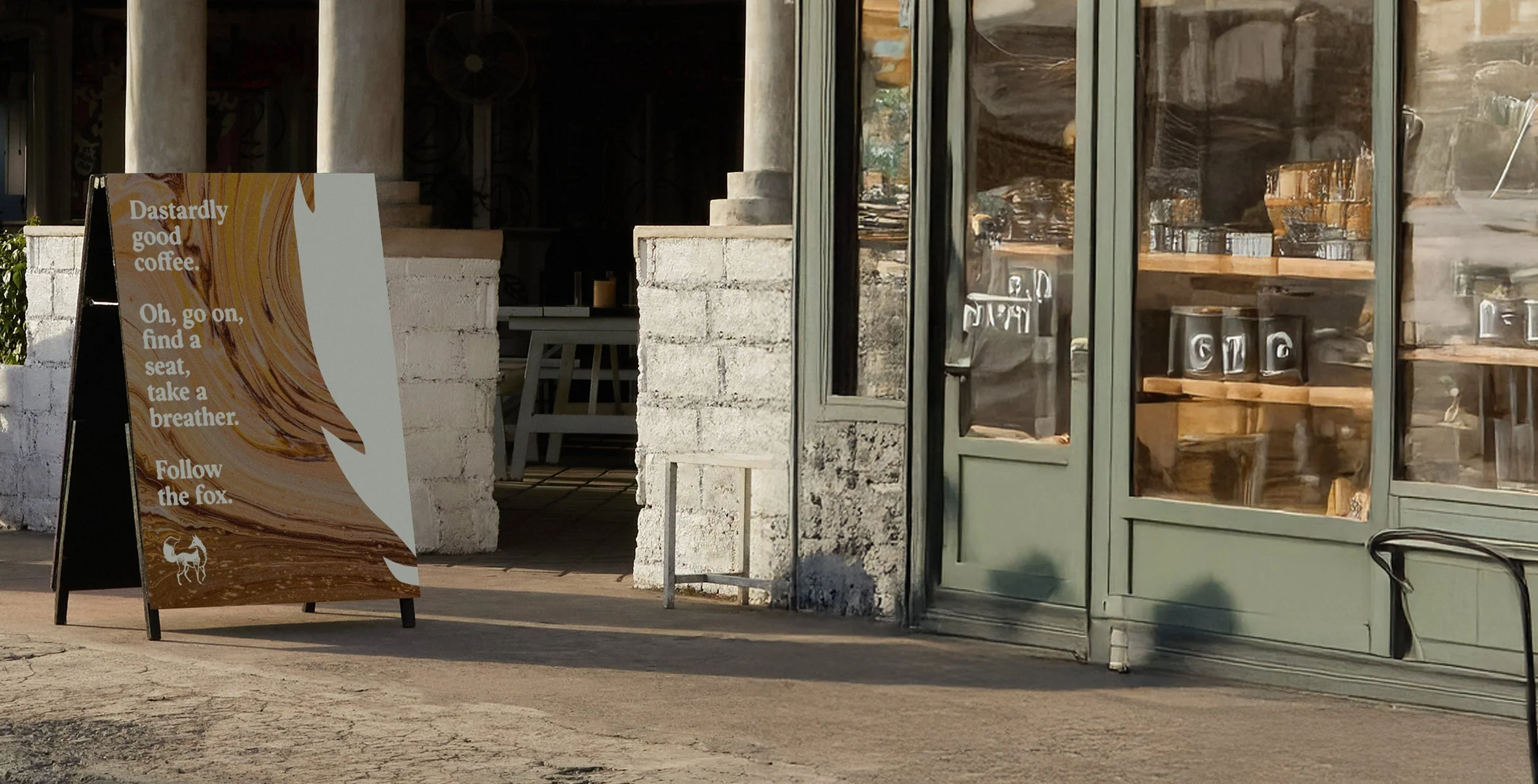 Coffee shop sign in front of independent coffee shop