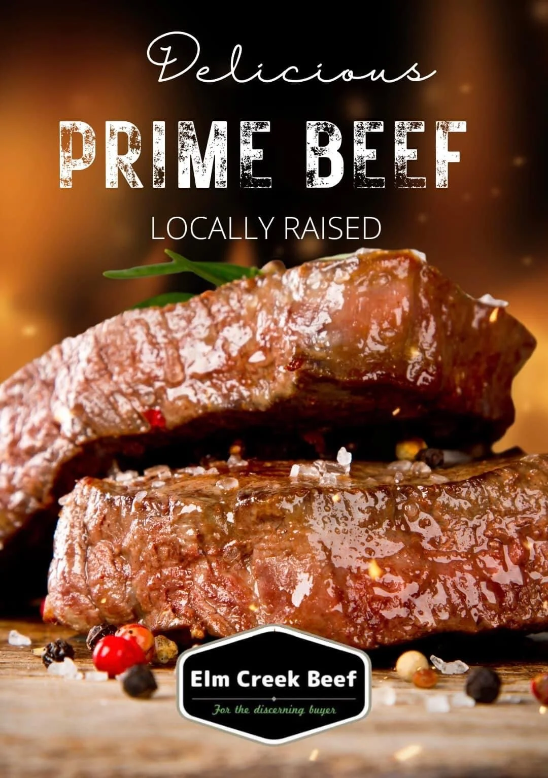 Elm Creek Beef Close-up of two cooked beef steaks with coarse sea salt, surrounded by multicolored peppercorns, with some salt grains spilled on the wooden surface. Background is blurred with warm tones.