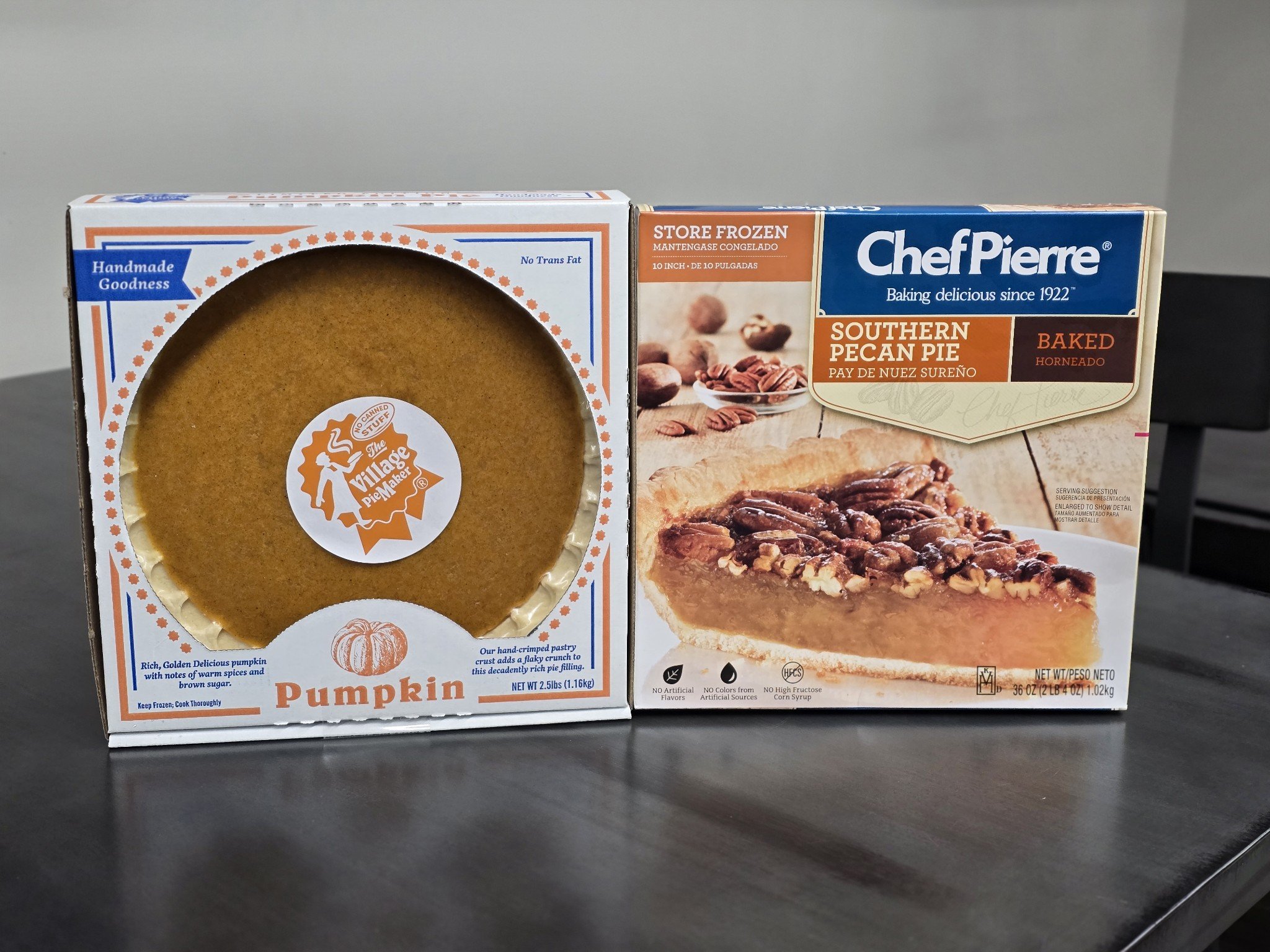 Elm Creek Beef Boxed pumpkin pie and Southern pecan pie on a table from the pie village company