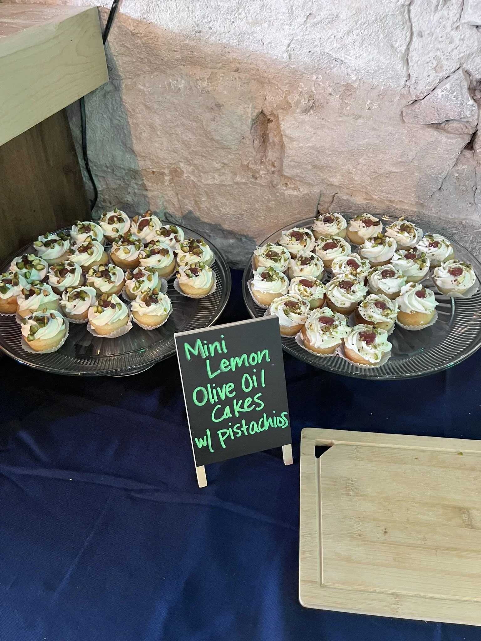 Elm Creek Beef Mini Lemon Olive Oil Cakes with Pistachios on silver trays