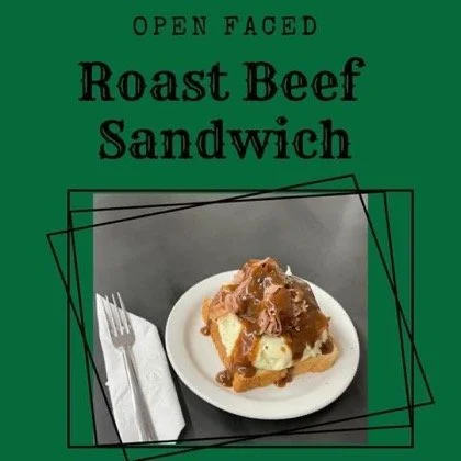 Elm Creek Beef Sign advertising an open-faced roast beef sandwich with a photo of the sandwich on a plate, a fork, and a napkin.