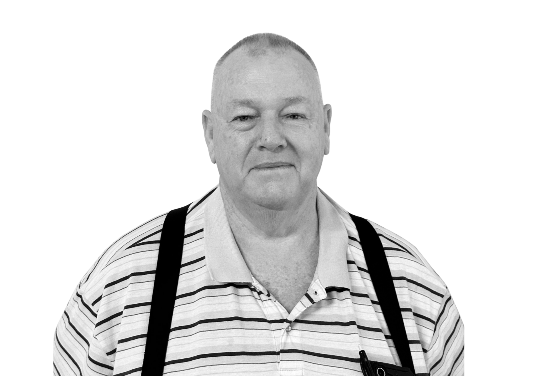 Black and white portrait of a middle-aged man with short hair, wearing a striped polo shirt with a collar, and suspenders, against a plain white background.