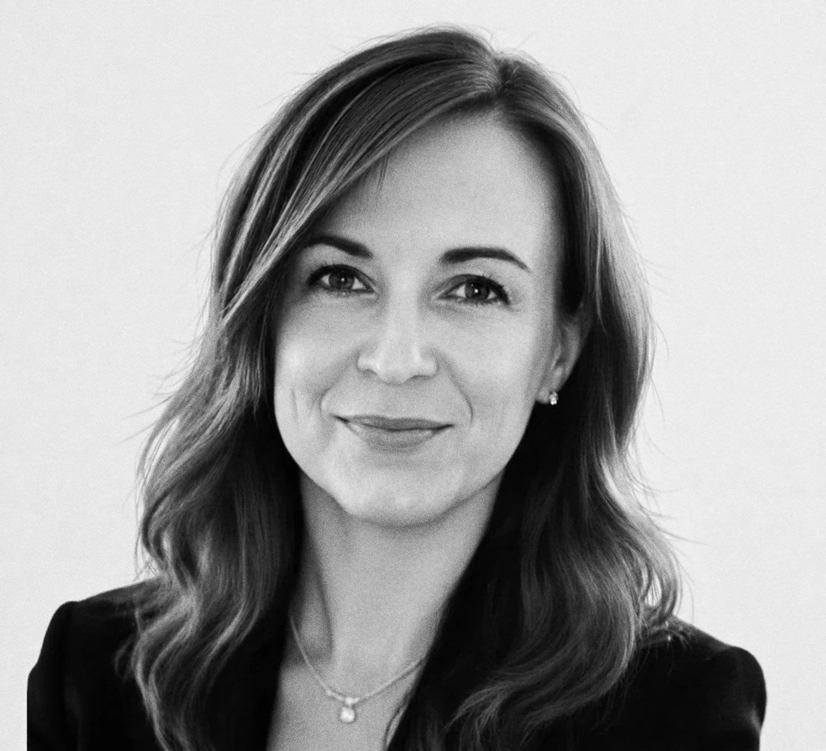 Black and white photograph of the brand strategy and advertising executive Jennifer Bonhomme. She is the Founder and Strategy Principal at WOMB New York.