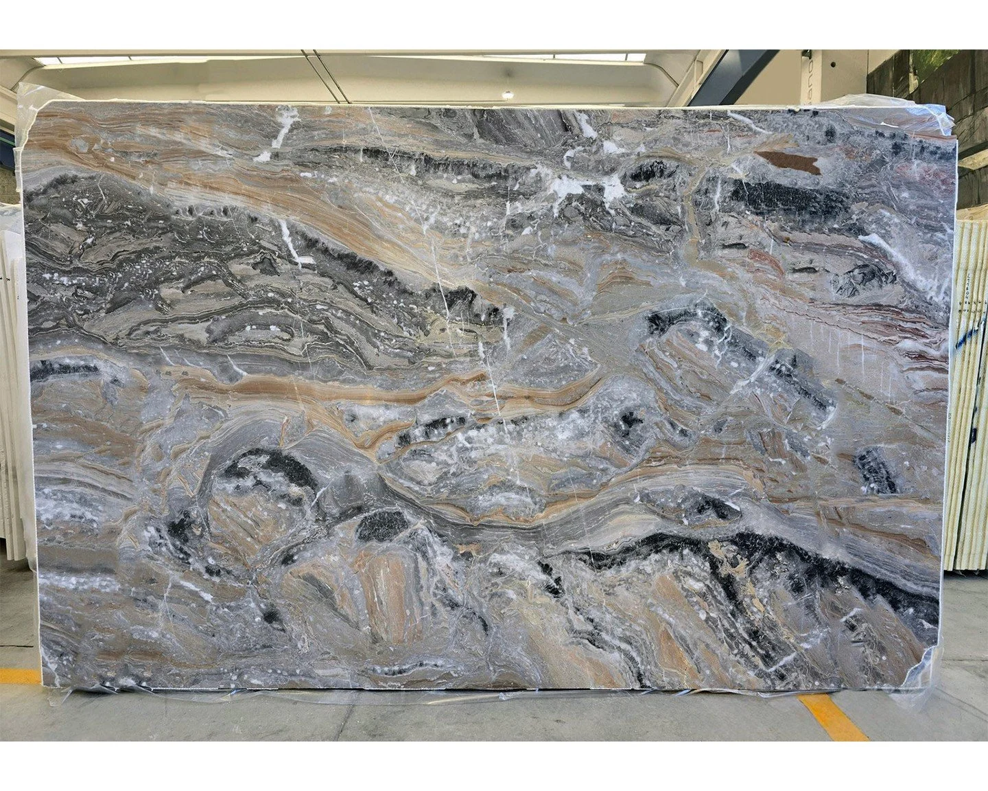 Are you familiar with Arabescato Orobico Grigio marble?
Drama meets elegance in this breathtaking marble quarried from the Cornalita Quarry in Italy. A swirling dance of dark & light grey, enriched with golden and white veins, creates movement an
