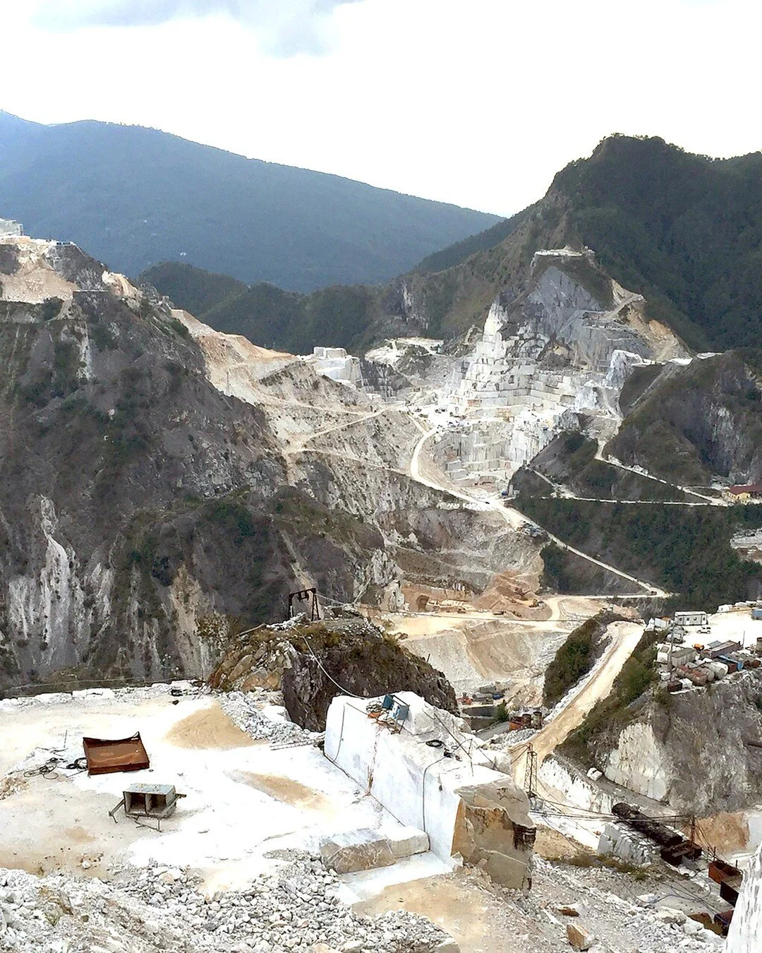 A sweeping view across the legendary Carrara quarries, carved into the Apuan Alps for centuries. From this rugged landscape comes some of the world&rsquo;s most celebrated marbles.