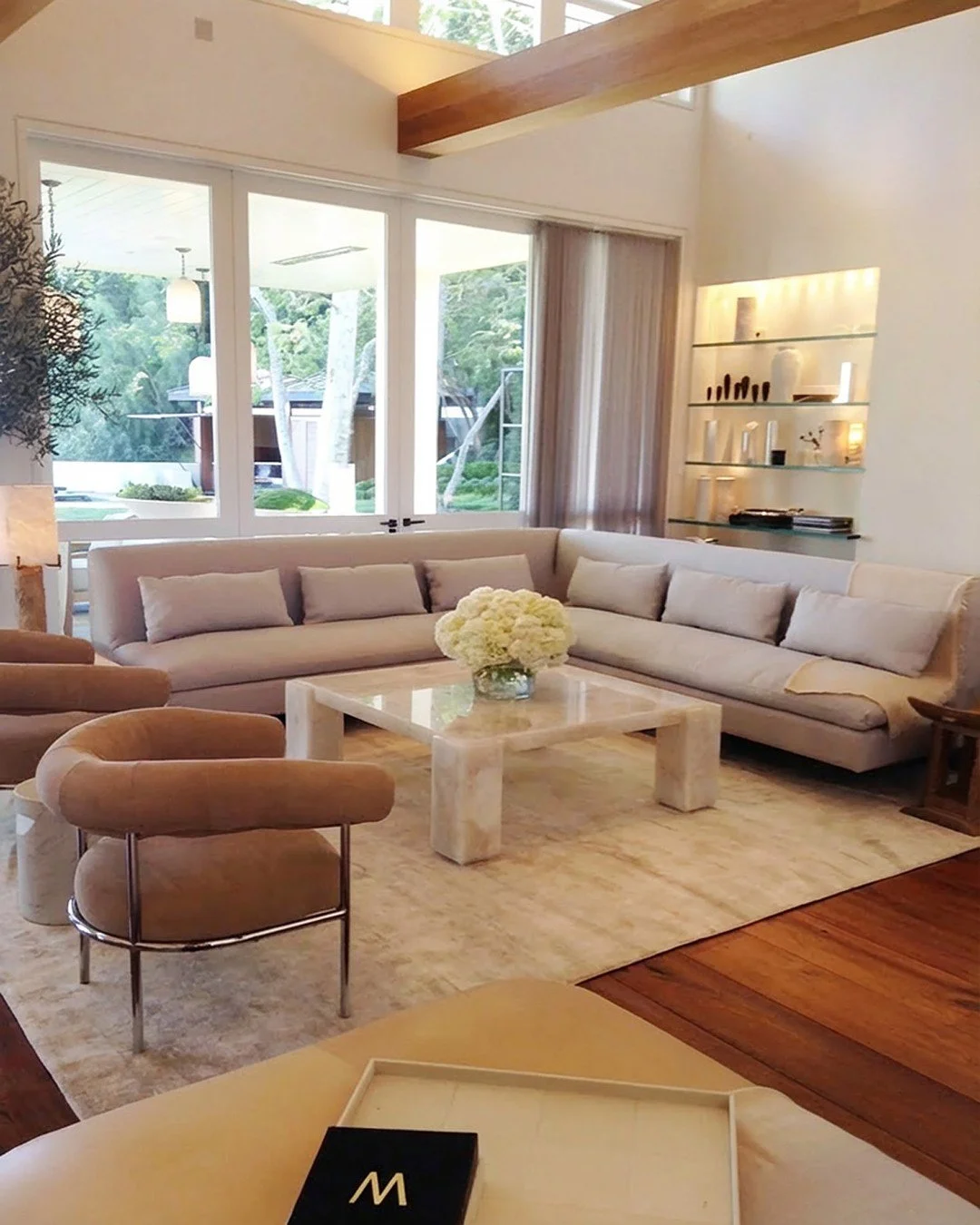 A custom marble coffee table designed for a Beverly Hills residence.

Carved with clean geometry and softened by natural stone variation. Its substantial form balances the relaxed upholstery and warm wood architecture, allowing the veining and mass o