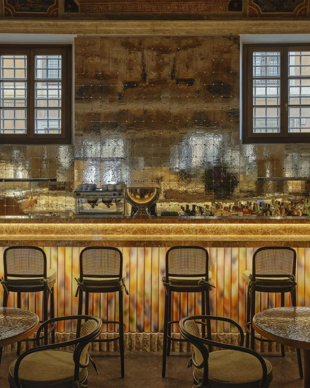 At @palazzo.talia in Rome, color and craftsmanship take center stage.

Designed by  @studiolucaguadagnino , the bar counter and tables&mdash;crafted by @950.ninefifty in majolica-tiled lava stone under the artistic guidance of maestro Rosario Parrine