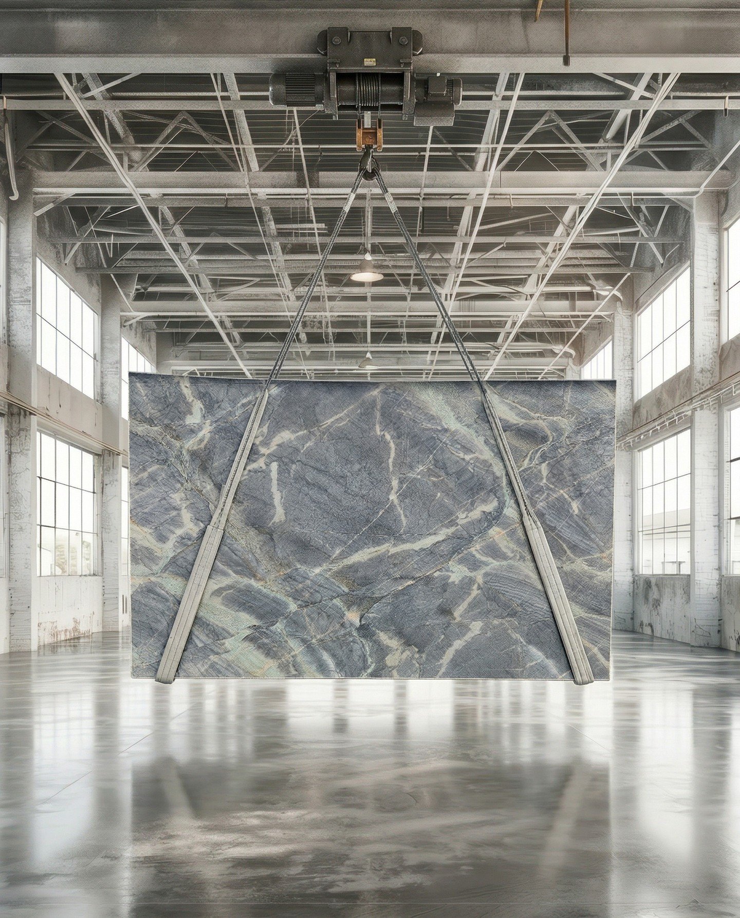 Zuma Quartzite. Pulled from the mountains of Brazil, this exotic stone shifts between steel blue, smoky grey, violet, and threads of warm gold &mdash; a palette that feels like coastline and storm clouds in the same breath.
Beyond the beauty, Zuma de
