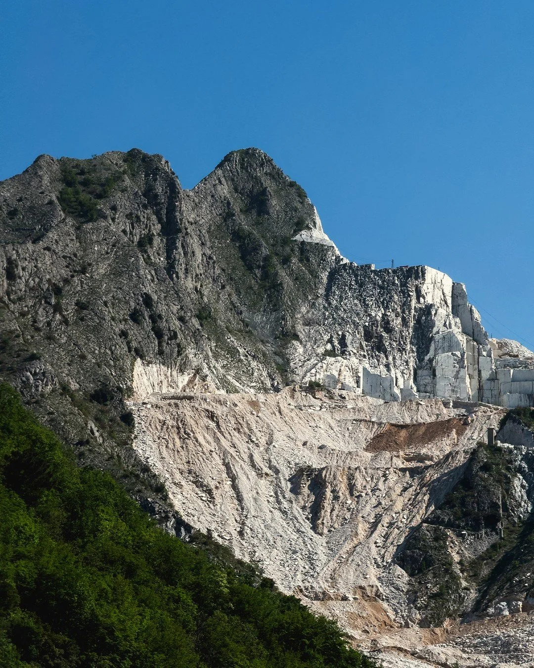So many beautiful projects start here. The Apuan Alps above Carrara &mdash; where the marble that ends up in your home, your lobby, your kitchen begins as a mountain.
