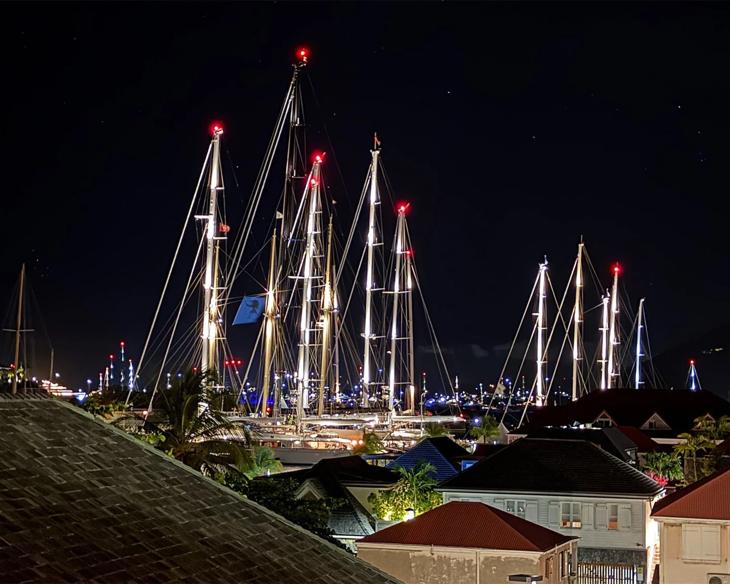 When the racing is done and the masts light up the night sky, St. Barts becomes something else entirely.
There are places in the world that feel like they exist outside of time &mdash; where the only schedule is dinner and the view. 
This was one of 