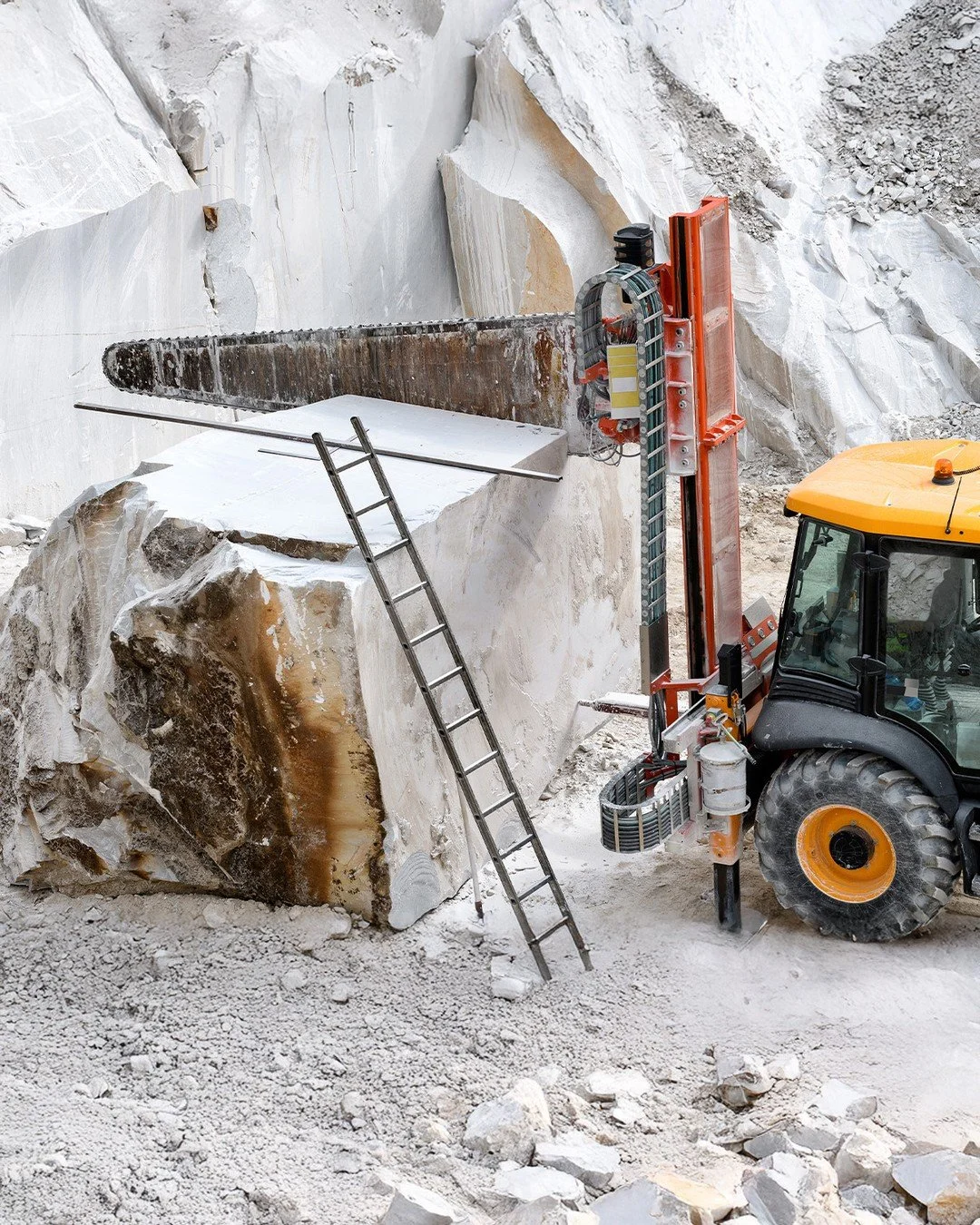 The cut that starts everything. A quarry chainsaw working through a block of marble in the Apuan Alps &mdash; precise, powerful, and completely unforgiving. There's no do-over at this stage.