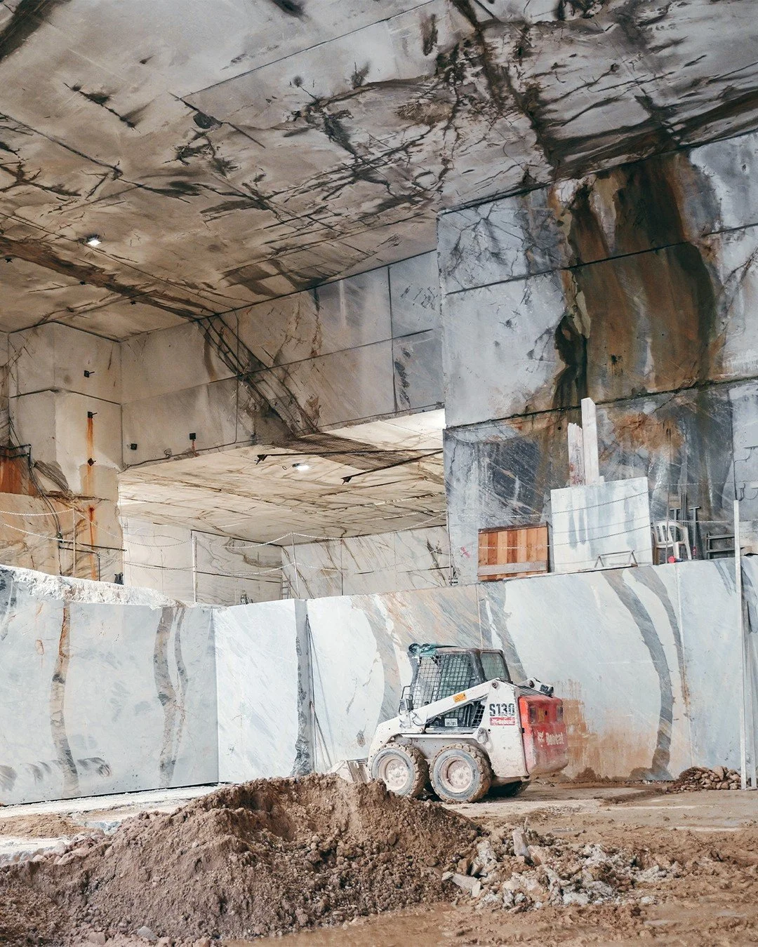 This is where it starts. Not in a showroom, not on a mood board. Here, under a mountain, in a space that feels more like a sacred hall than a construction site.
