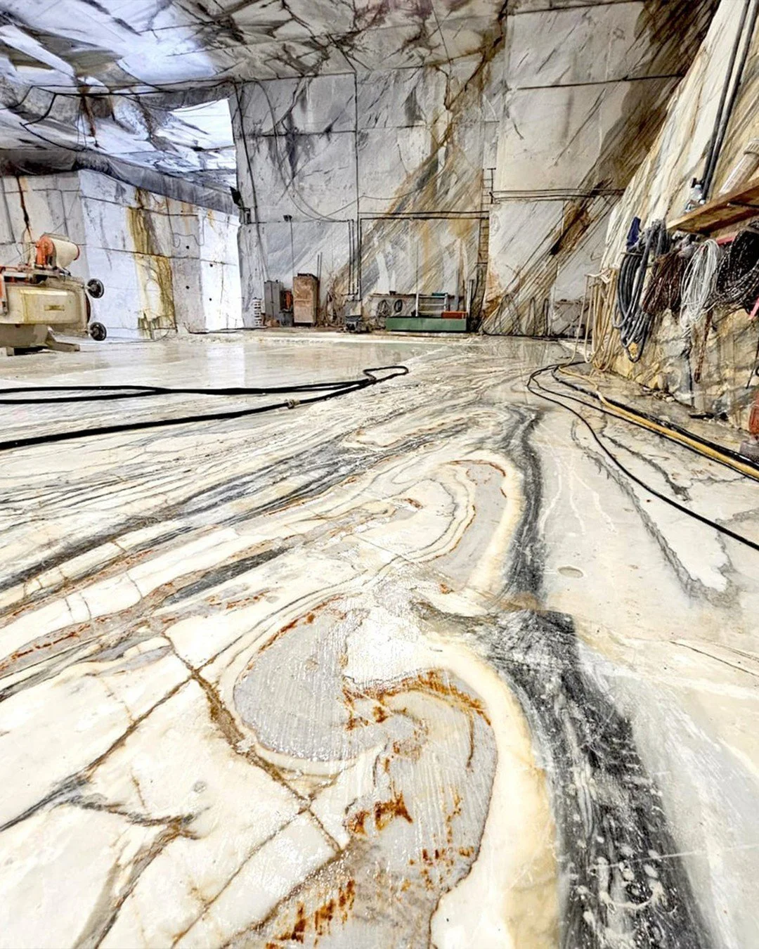 The only place in the world you will find a single slab seamless marble floor this big.  The inside of a quarry!