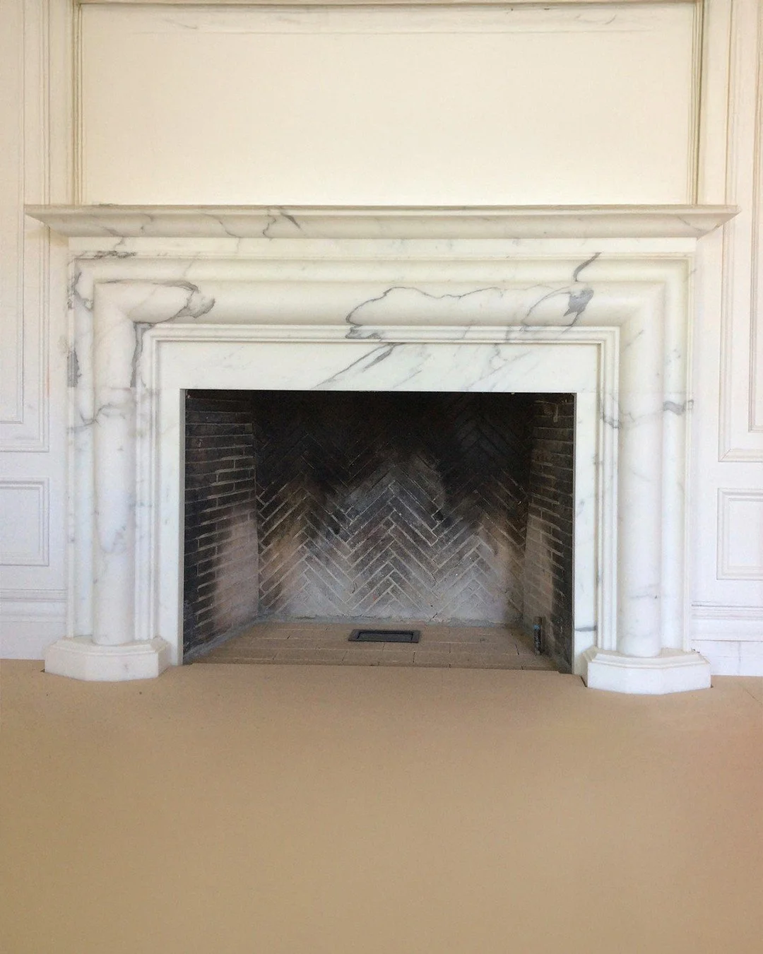 Statuario doesn't need a room to make a statement. It just needs the right hands to shape it.

This custom-carved fireplace surround was fabricated from a single selection of Statuario marble &mdash; the column bases, the molded surround, the mantel 