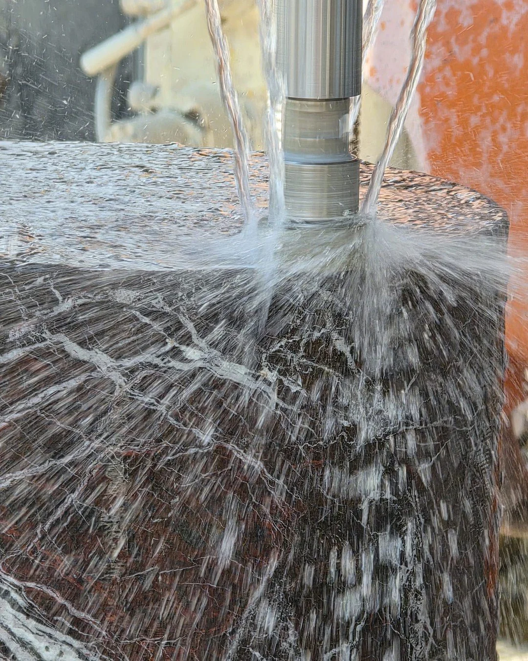 This is what precision looks like at full speed.
A diamond drill, water cooling, and a block of natural stone that started in a mountain.